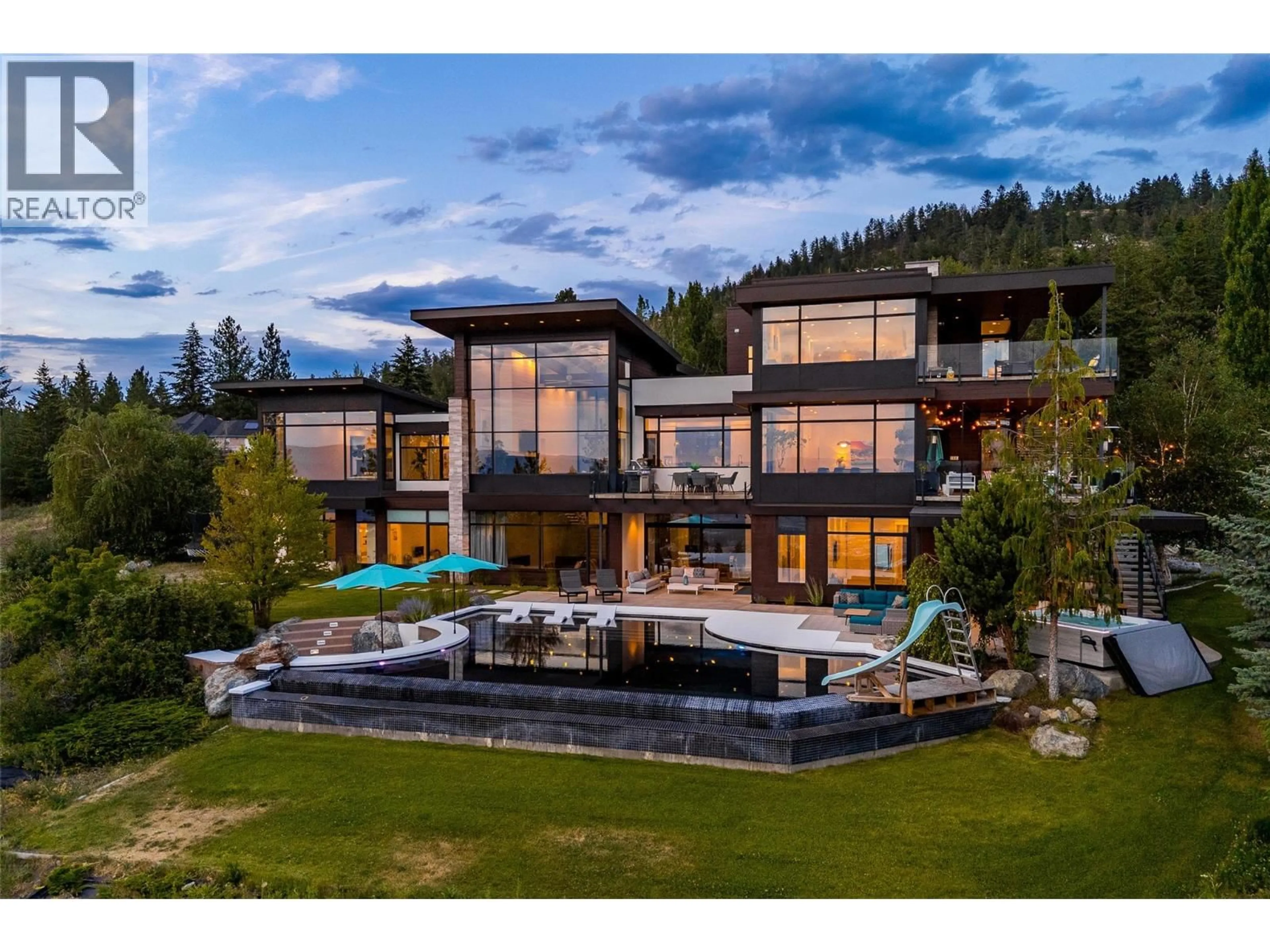 A pic from outside/outdoor area/front of a property/back of a property/a pic from drone, mountain view for 4425 TWIN CREEK PLACE, Kelowna British Columbia V1X7V7