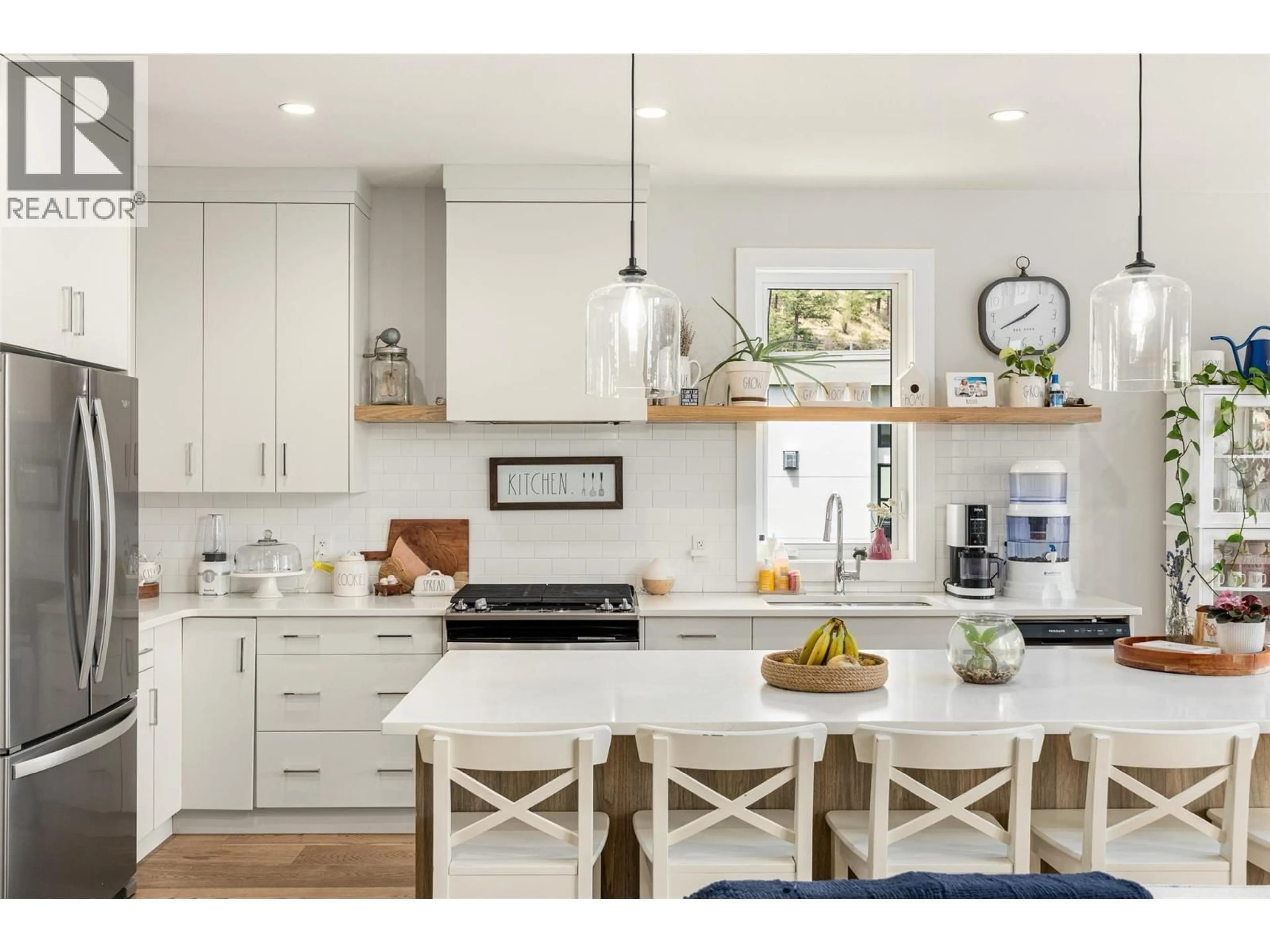 Open concept kitchen, wood/laminate floor for 10293 LONG ROAD, Lake Country British Columbia V4V0A9