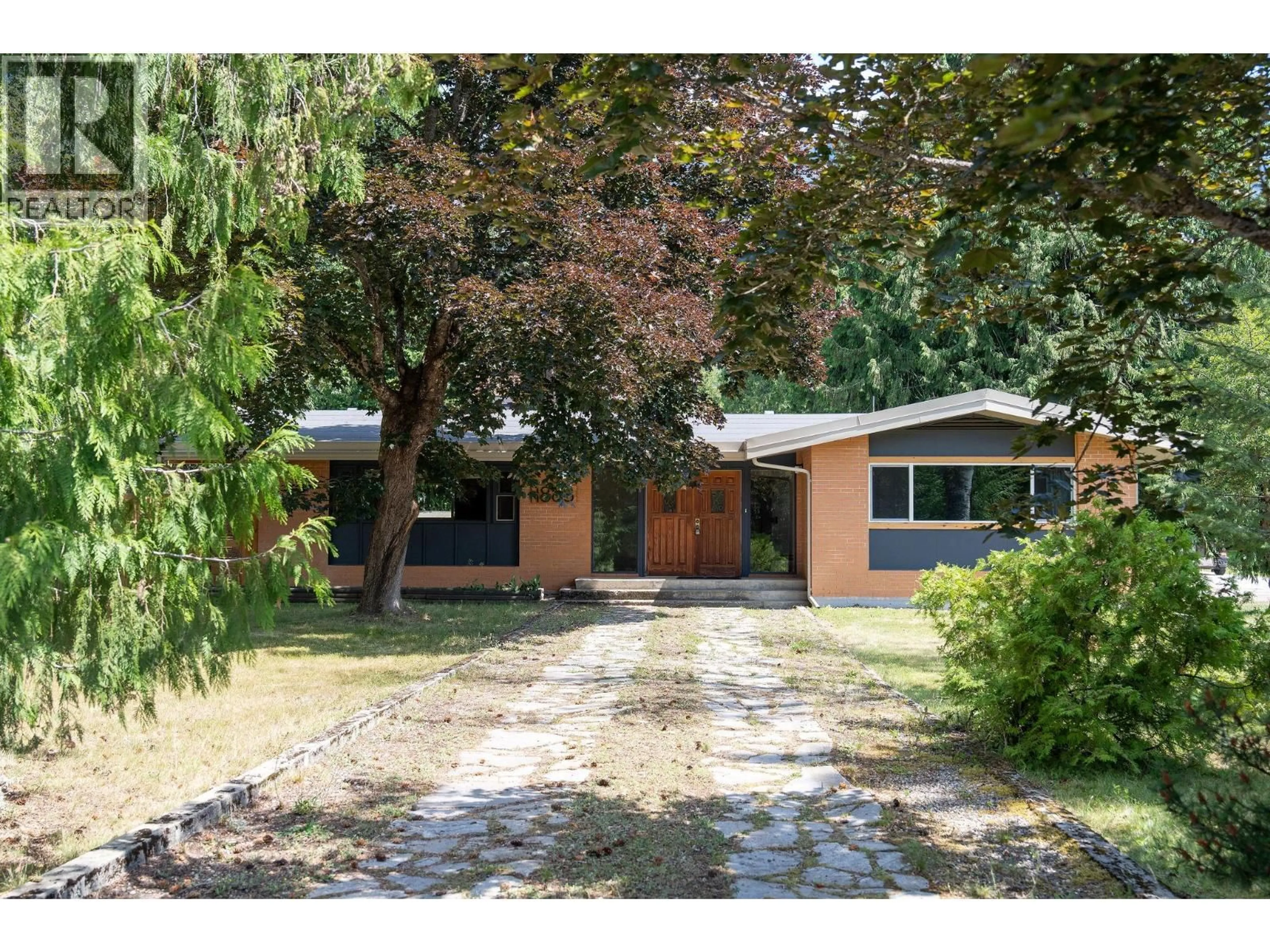 Home with brick exterior material, street for 1888 AIRPORT WAY, Revelstoke British Columbia V0E2S0