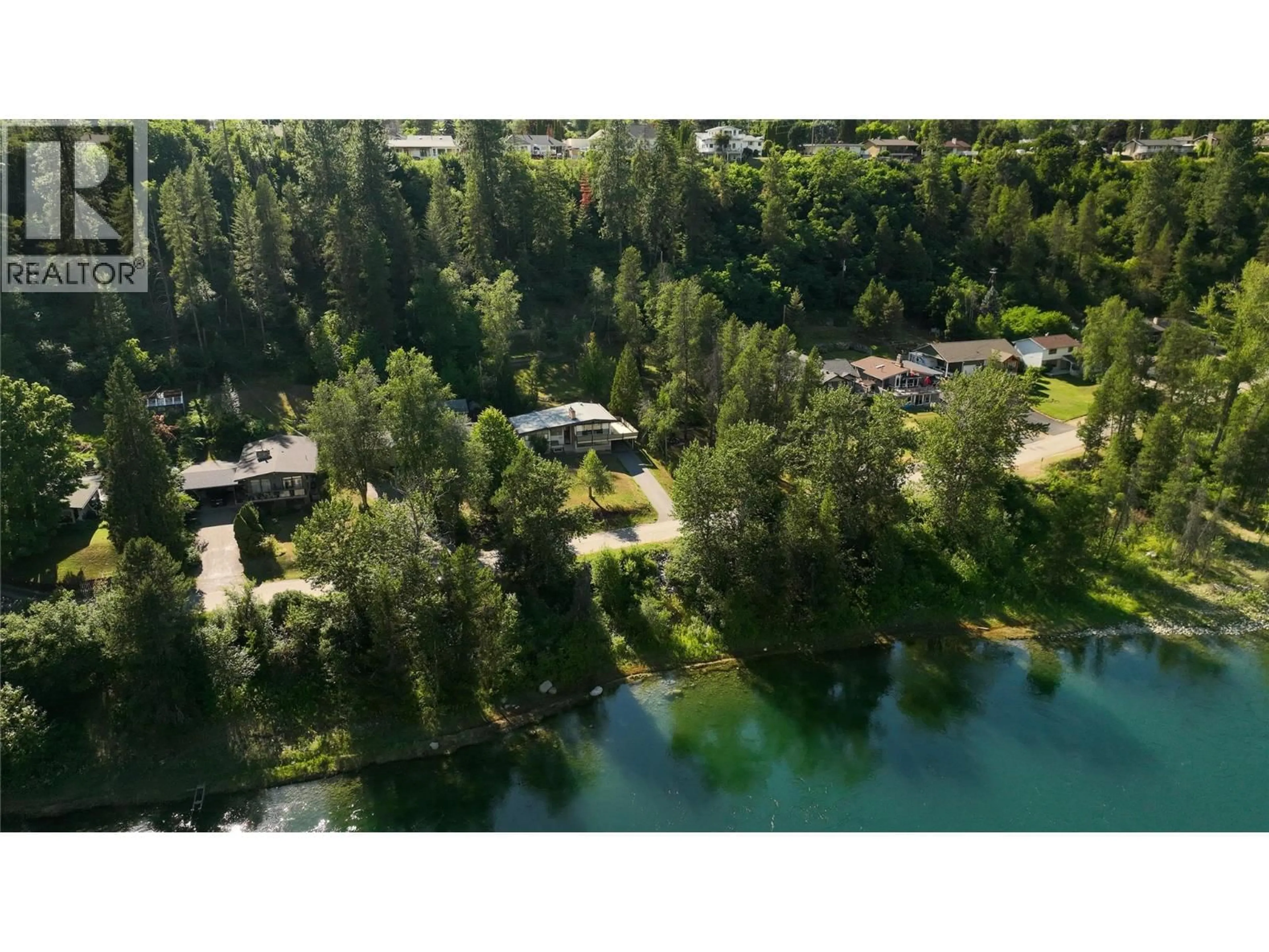 A pic from outside/outdoor area/front of a property/back of a property/a pic from drone, water/lake/river/ocean view for 3110 1ST AVENUE, Castlegar British Columbia V1N2R5