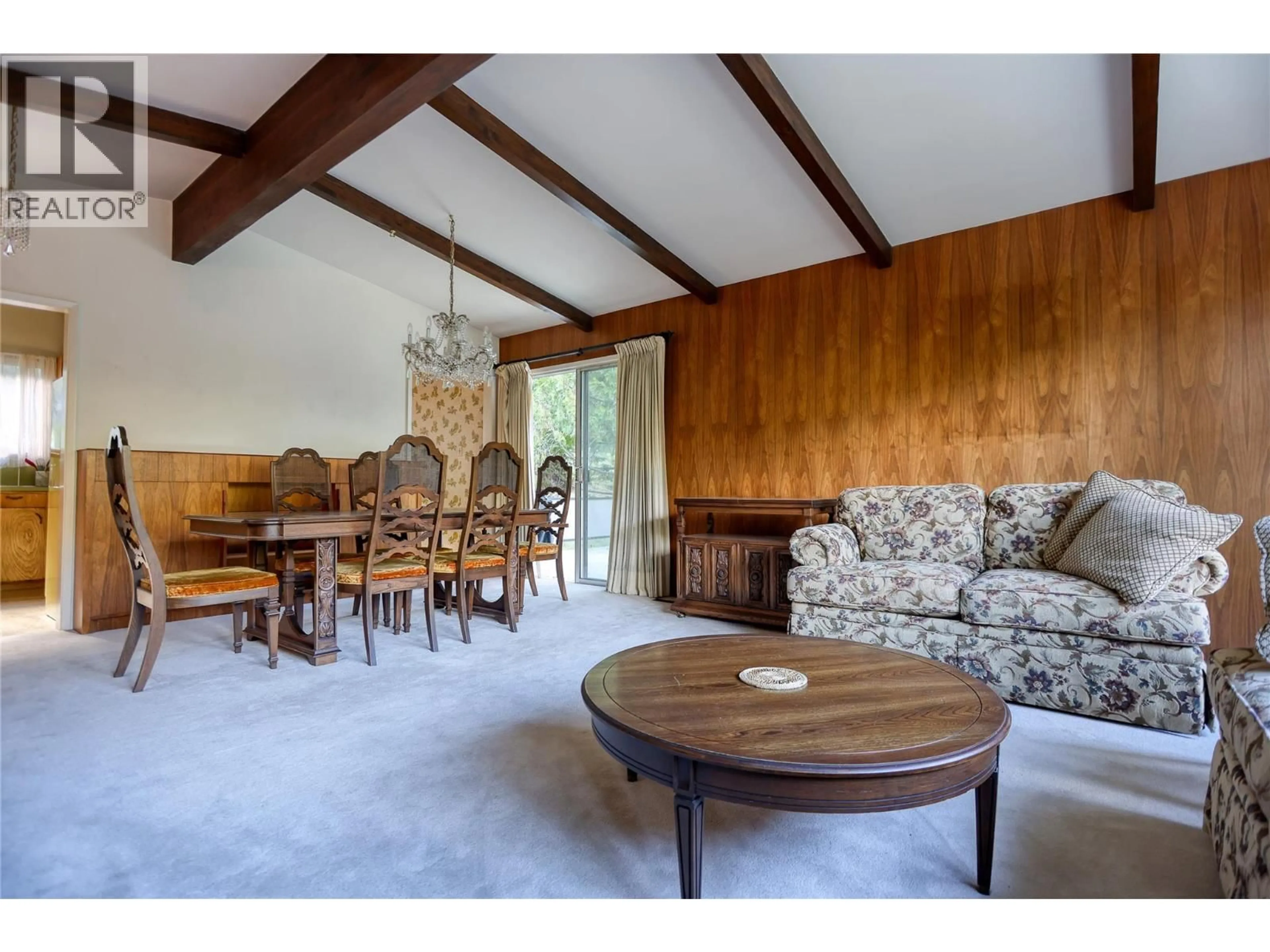 Living room with furniture, wood/laminate floor for 3110 1ST AVENUE, Castlegar British Columbia V1N2R5