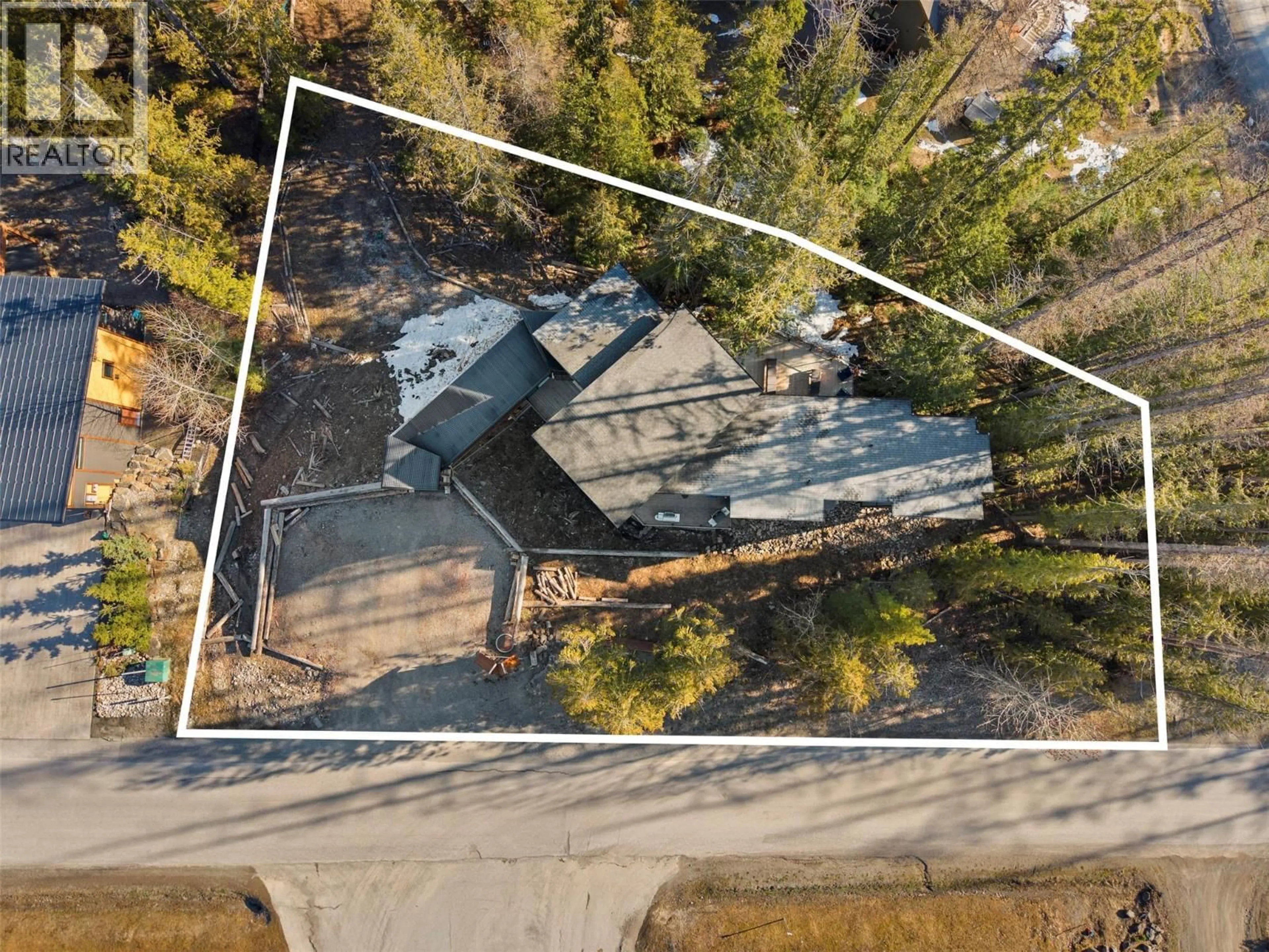 A pic from outside/outdoor area/front of a property/back of a property/a pic from drone, building for 5339 HIGHLINE DRIVE, Fernie British Columbia V0B1M6