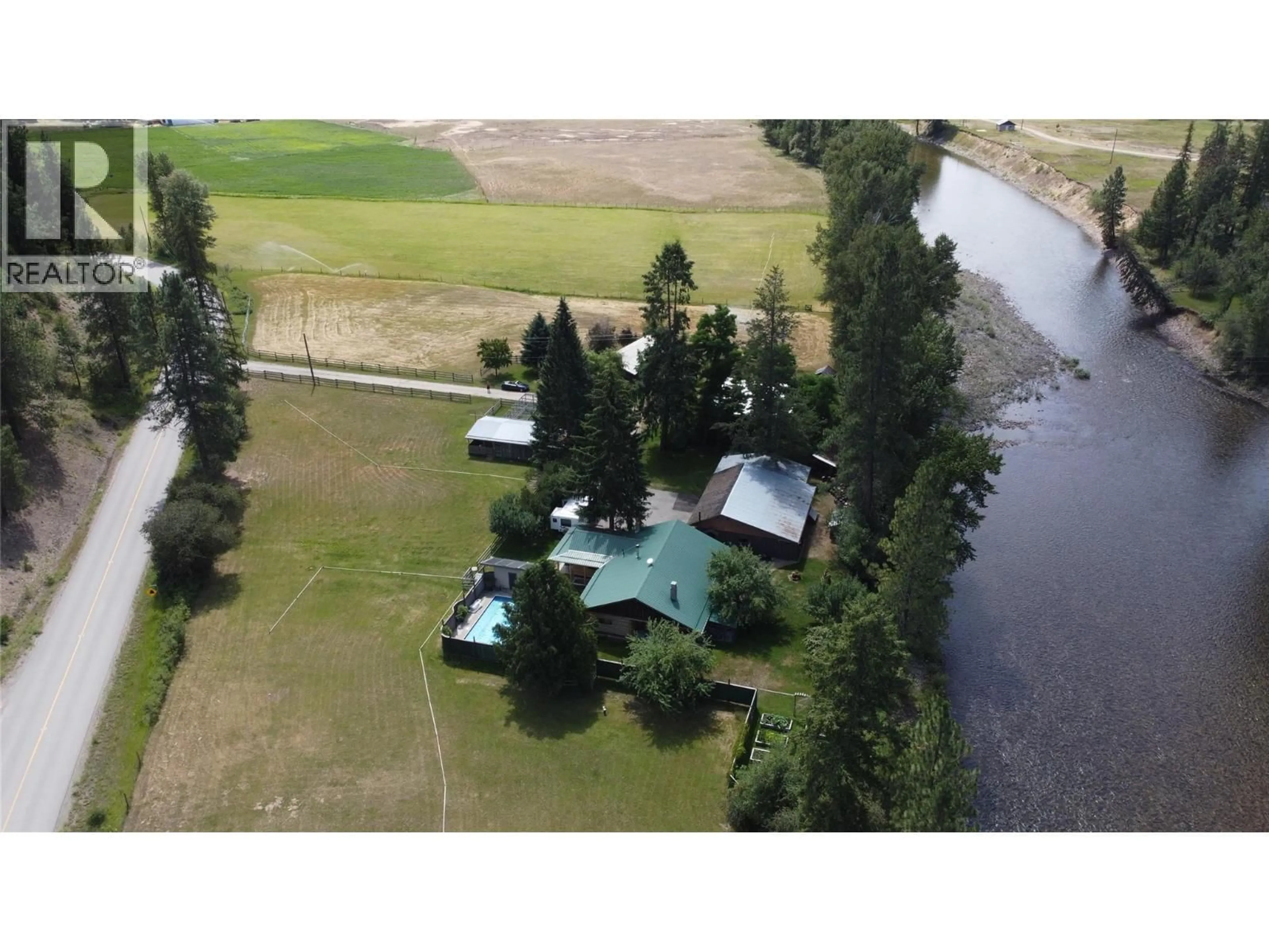 A pic from outside/outdoor area/front of a property/back of a property/a pic from drone, water/lake/river/ocean view for 9655 GRANBY ROAD, Grand Forks British Columbia V0H1H1