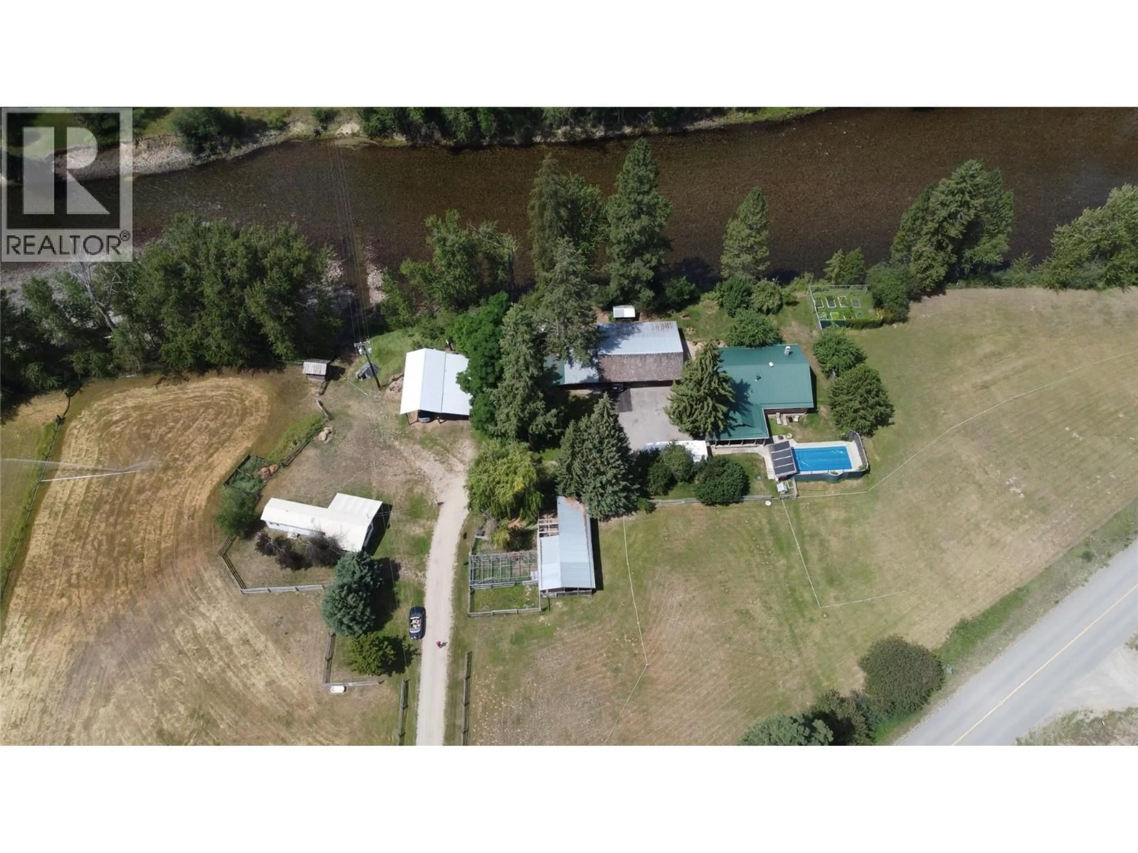 A pic from outside/outdoor area/front of a property/back of a property/a pic from drone, water/lake/river/ocean view for 9655 GRANBY ROAD, Grand Forks British Columbia V0H1H1