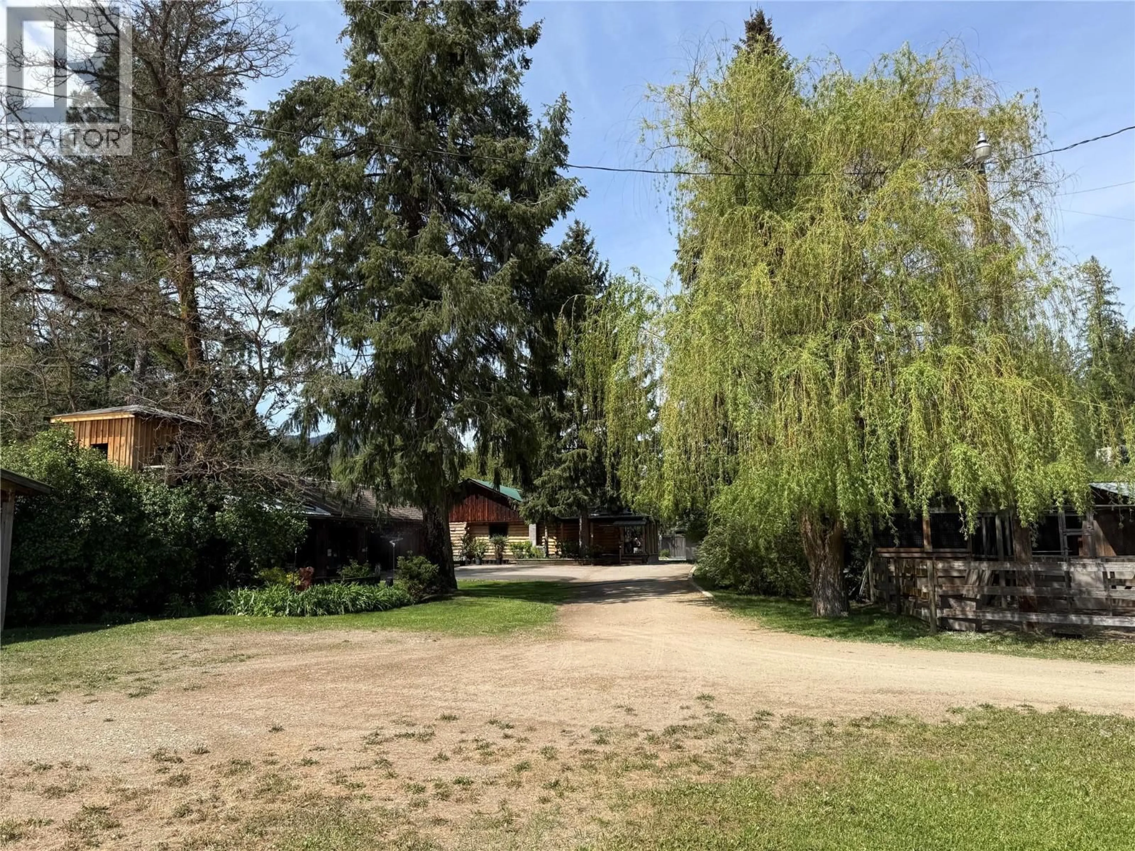A pic from outside/outdoor area/front of a property/back of a property/a pic from drone, street for 9655 GRANBY ROAD, Grand Forks British Columbia V0H1H1