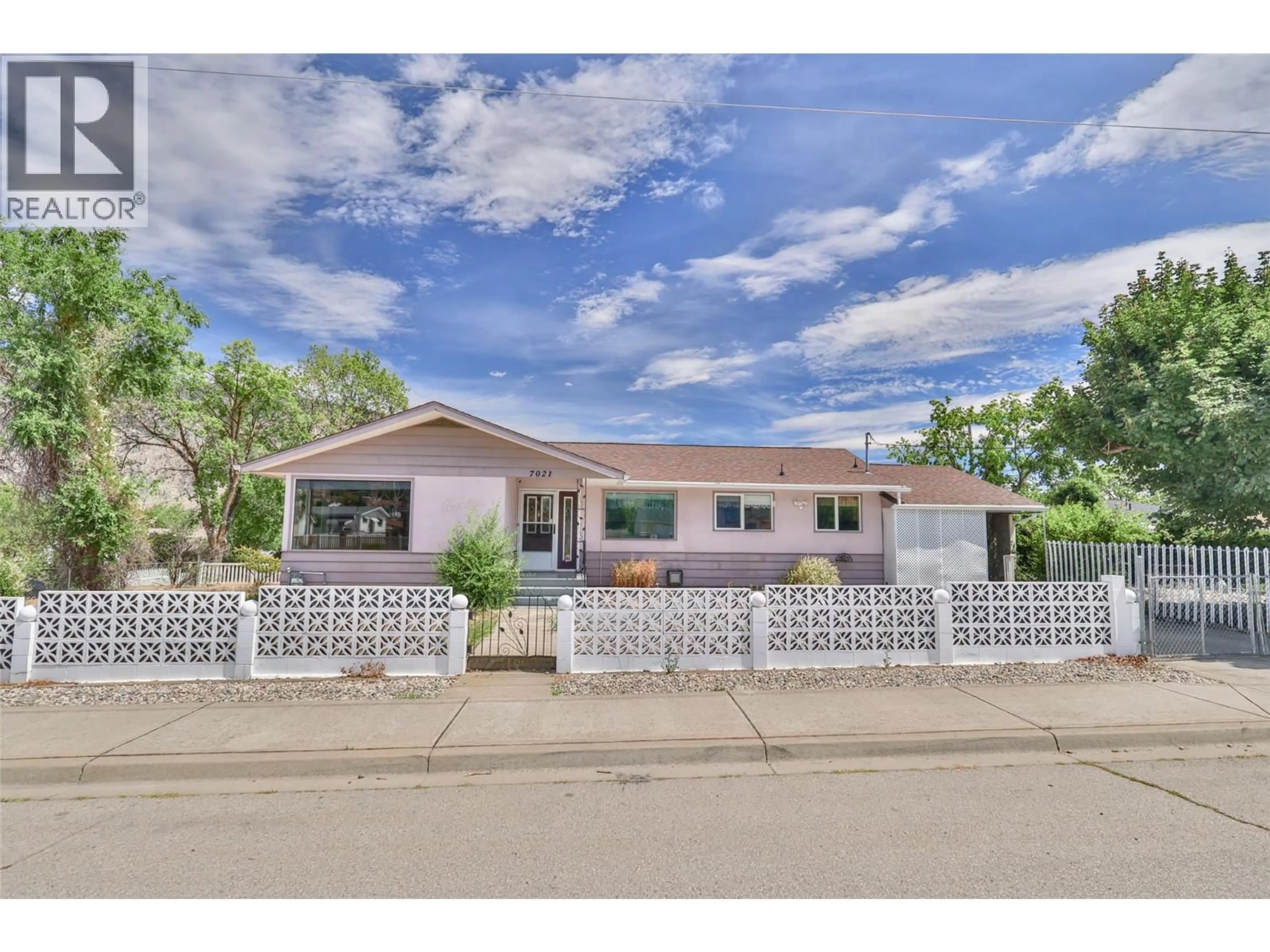 Home with vinyl exterior material, street for 7021 87TH STREET, Osoyoos British Columbia V0H1V0