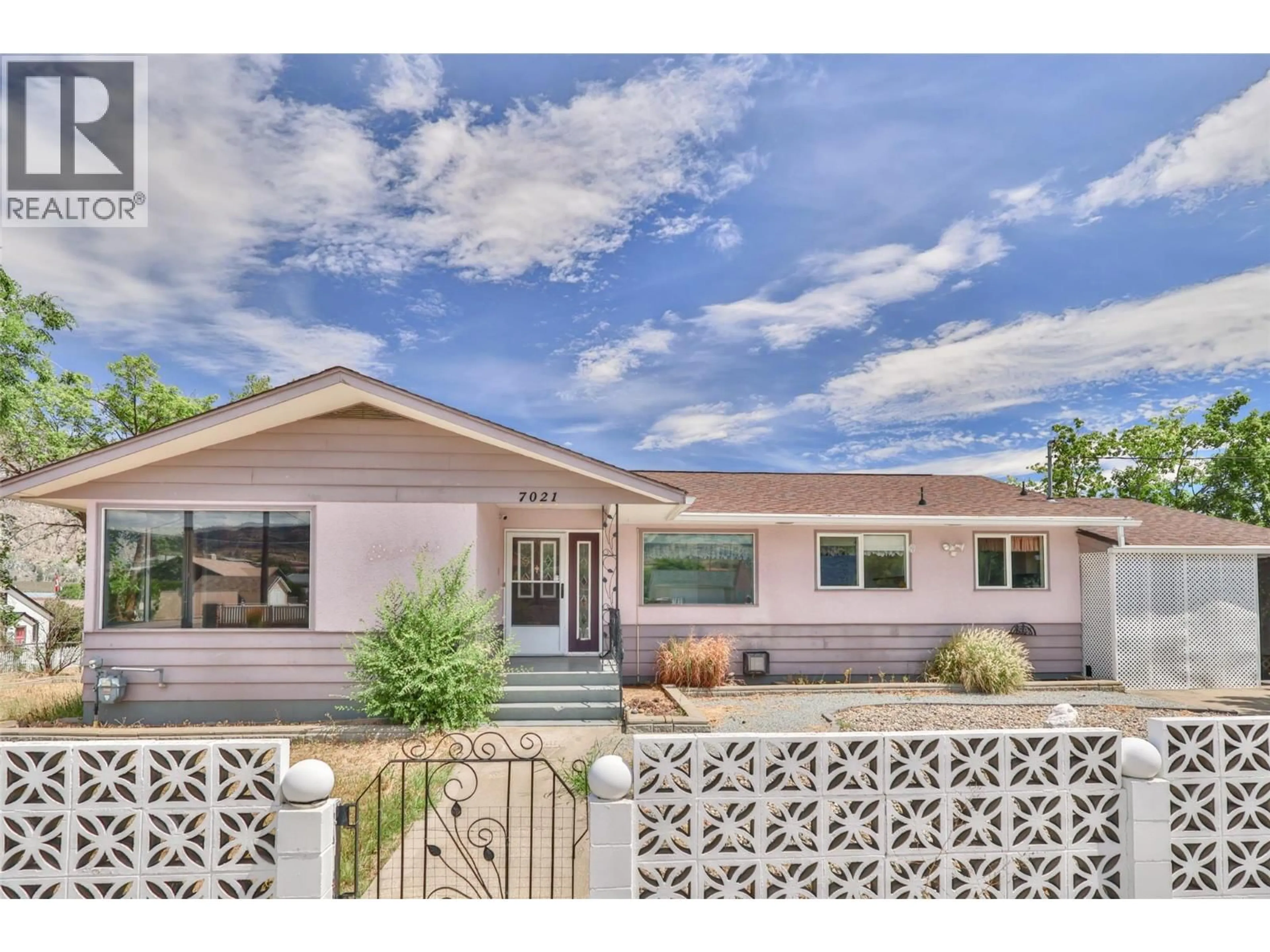 Home with vinyl exterior material, street for 7021 87TH STREET, Osoyoos British Columbia V0H1V0