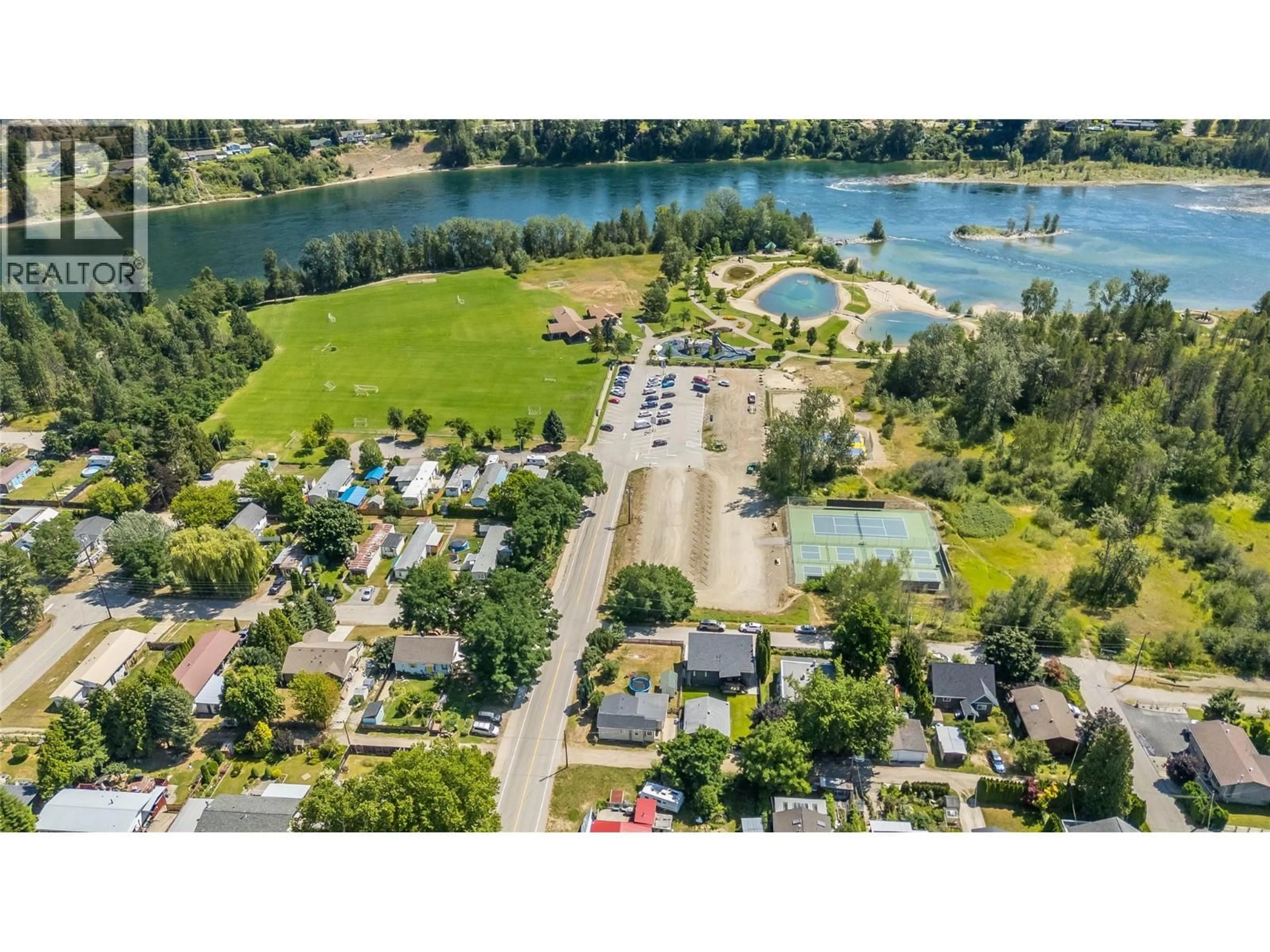A pic from outside/outdoor area/front of a property/back of a property/a pic from drone, water/lake/river/ocean view for 502 3RD AVENUE, Castlegar British Columbia V1N1Y2