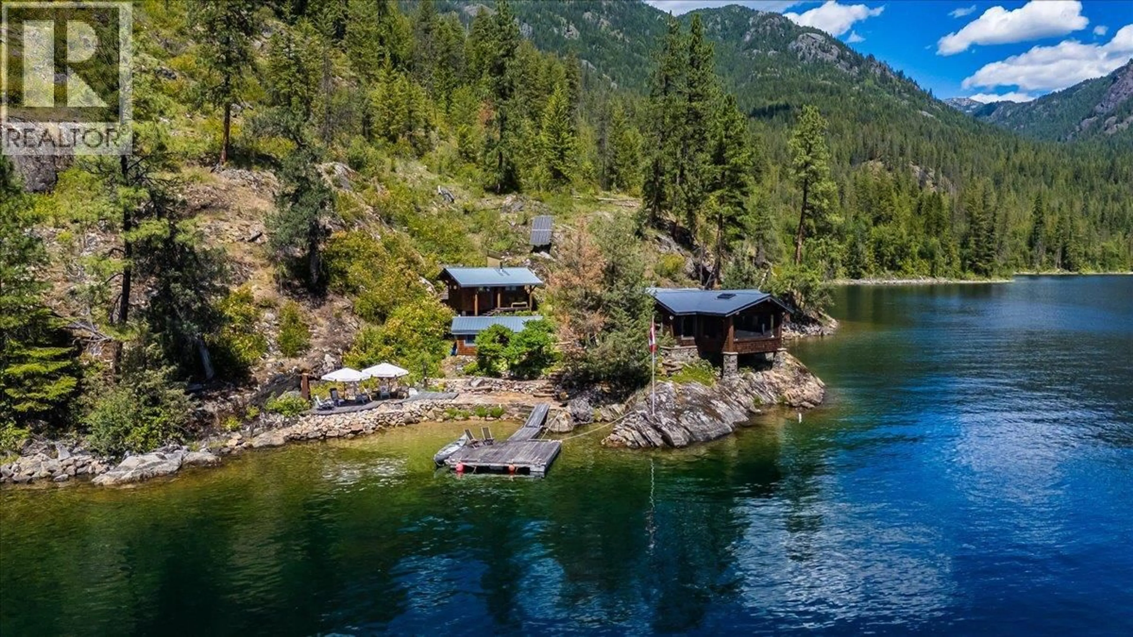 A pic from outside/outdoor area/front of a property/back of a property/a pic from drone, water/lake/river/ocean view for 4660 BOAT ACCESS WEST SIDE OTHER, Christina Lake British Columbia V0H1E0
