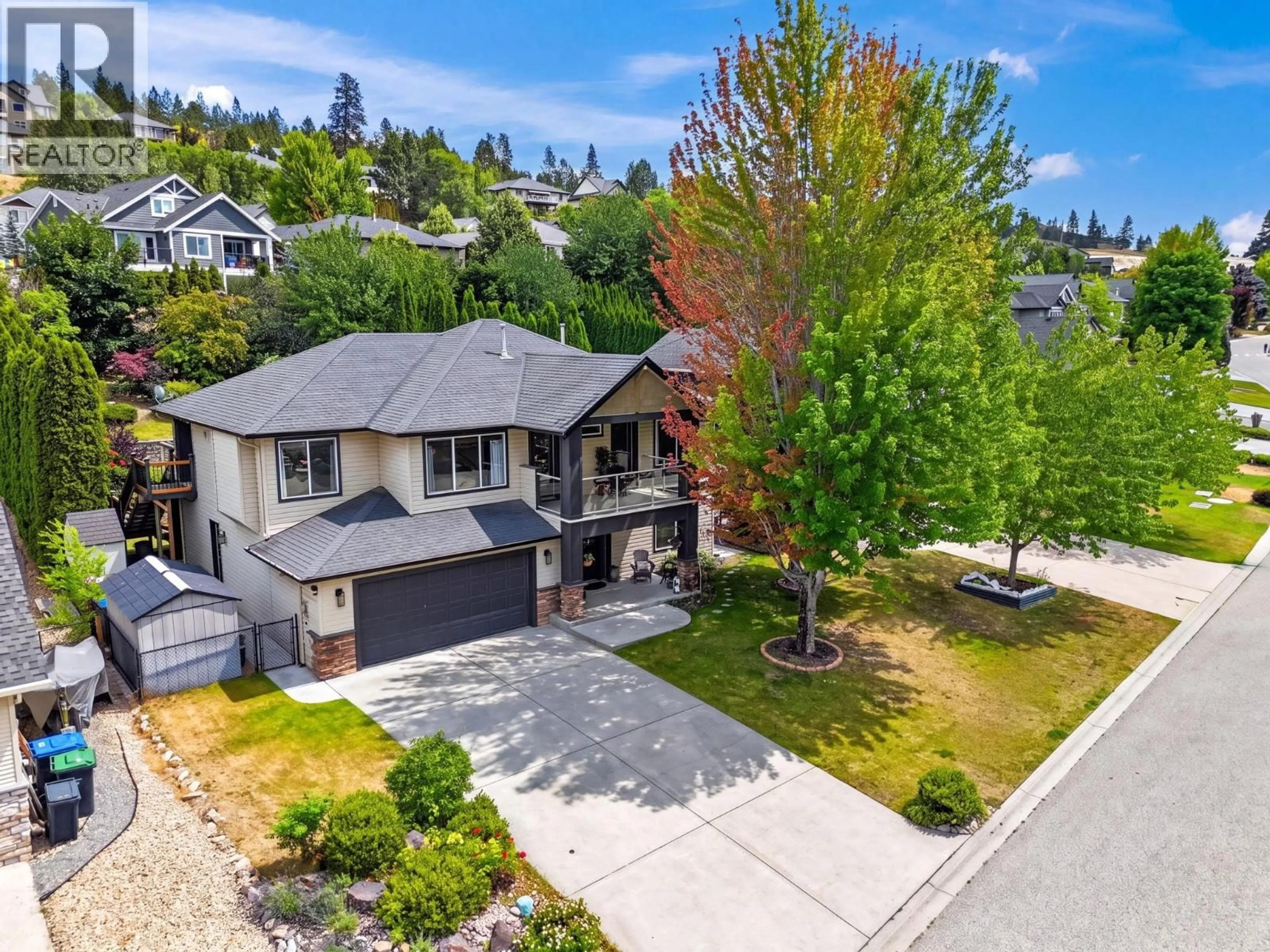 A pic from outside/outdoor area/front of a property/back of a property/a pic from drone, street for 10425 SHERMAN DRIVE, Lake Country British Columbia V4V2N2