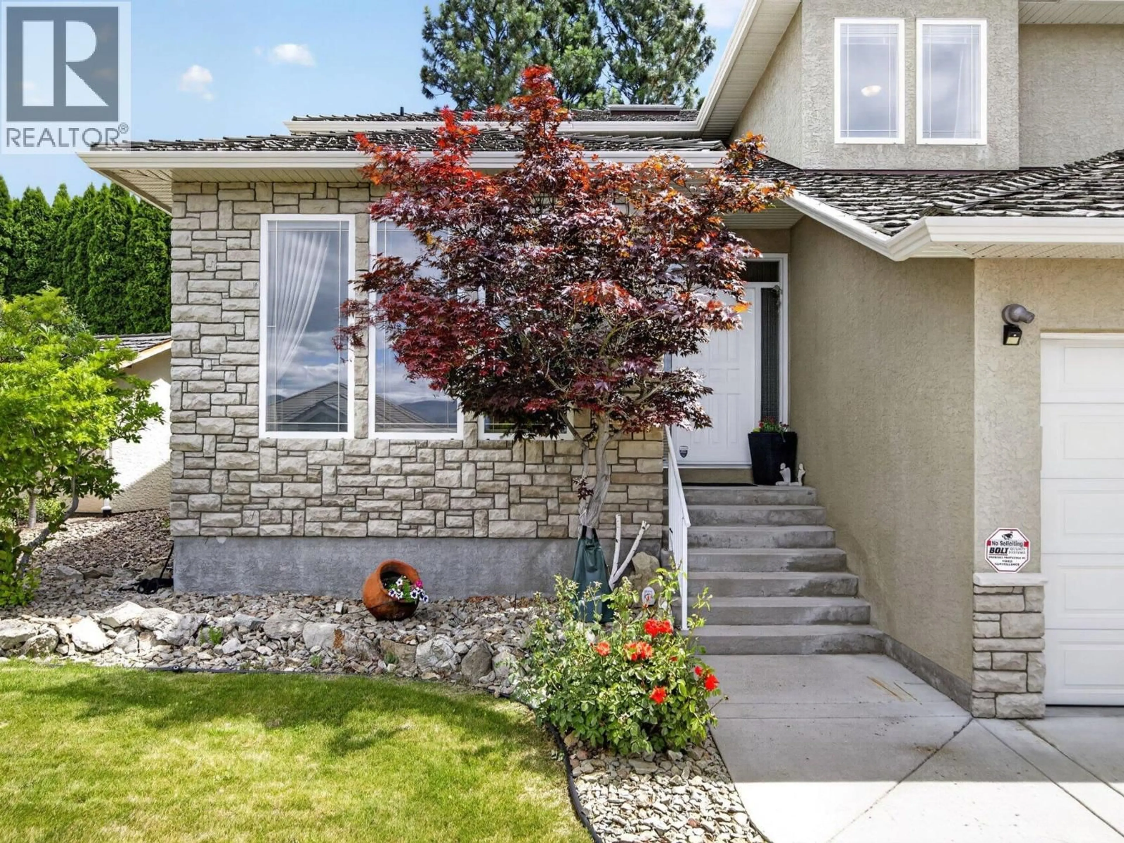 Home with brick exterior material, street for 969 SKEENA DRIVE, Kelowna British Columbia V1V2K7