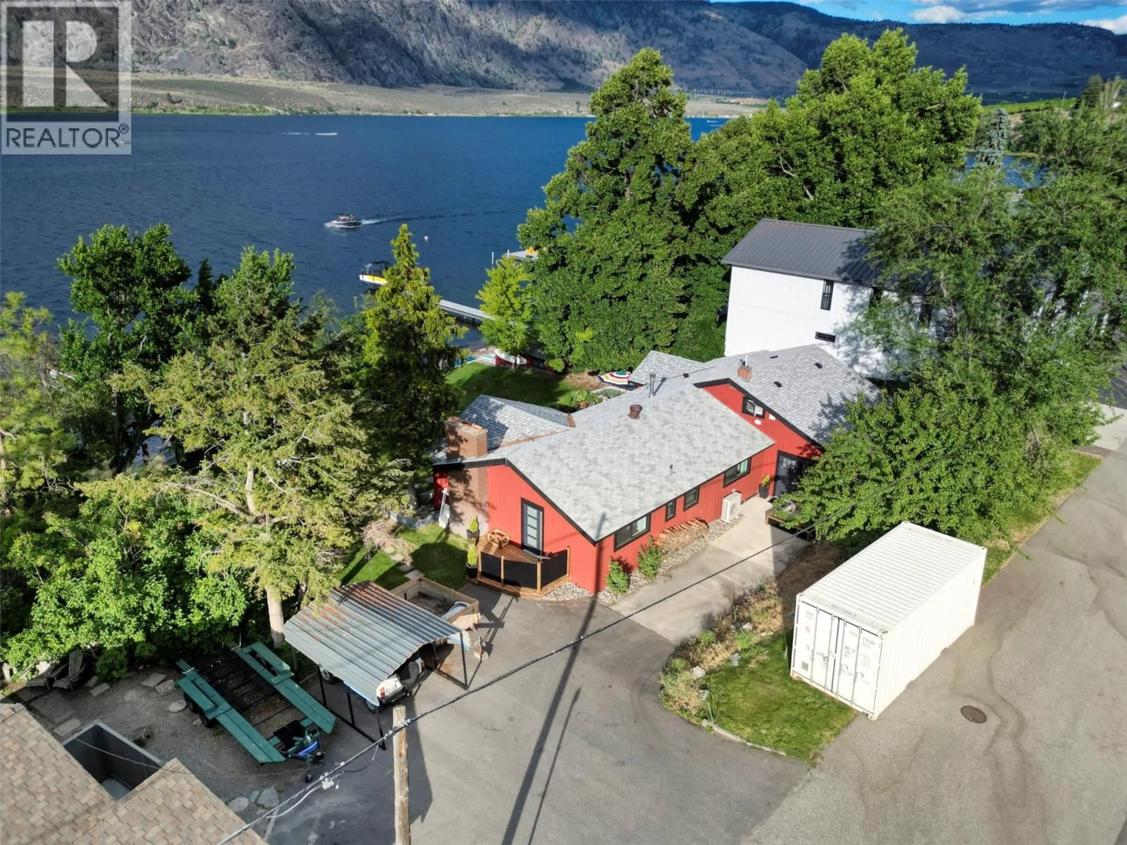 A pic from outside/outdoor area/front of a property/back of a property/a pic from drone, water/lake/river/ocean view for 10617 81ST STREET, Osoyoos British Columbia V0H1V2