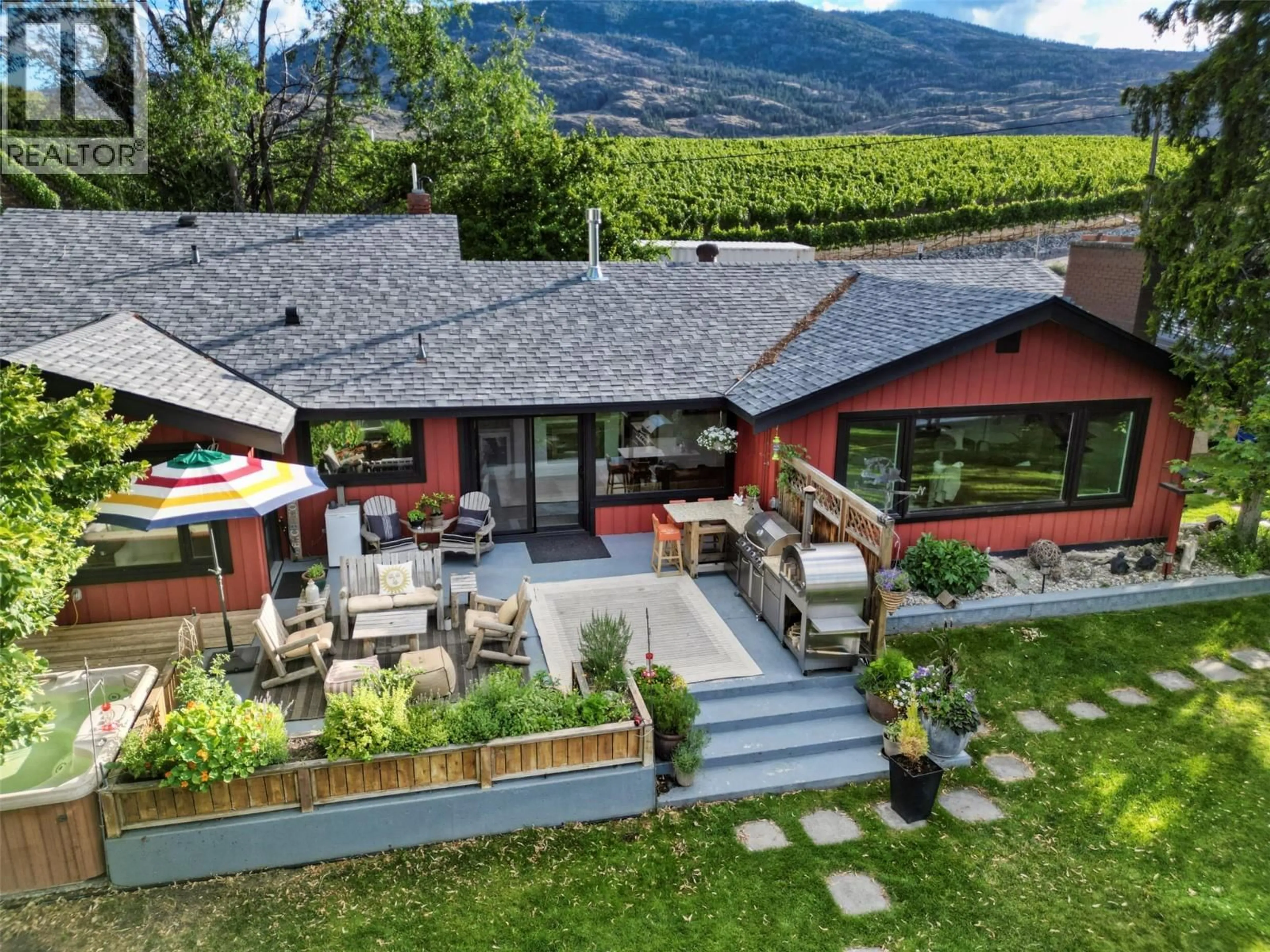A pic from outside/outdoor area/front of a property/back of a property/a pic from drone, mountain view for 10617 81ST STREET, Osoyoos British Columbia V0H1V2