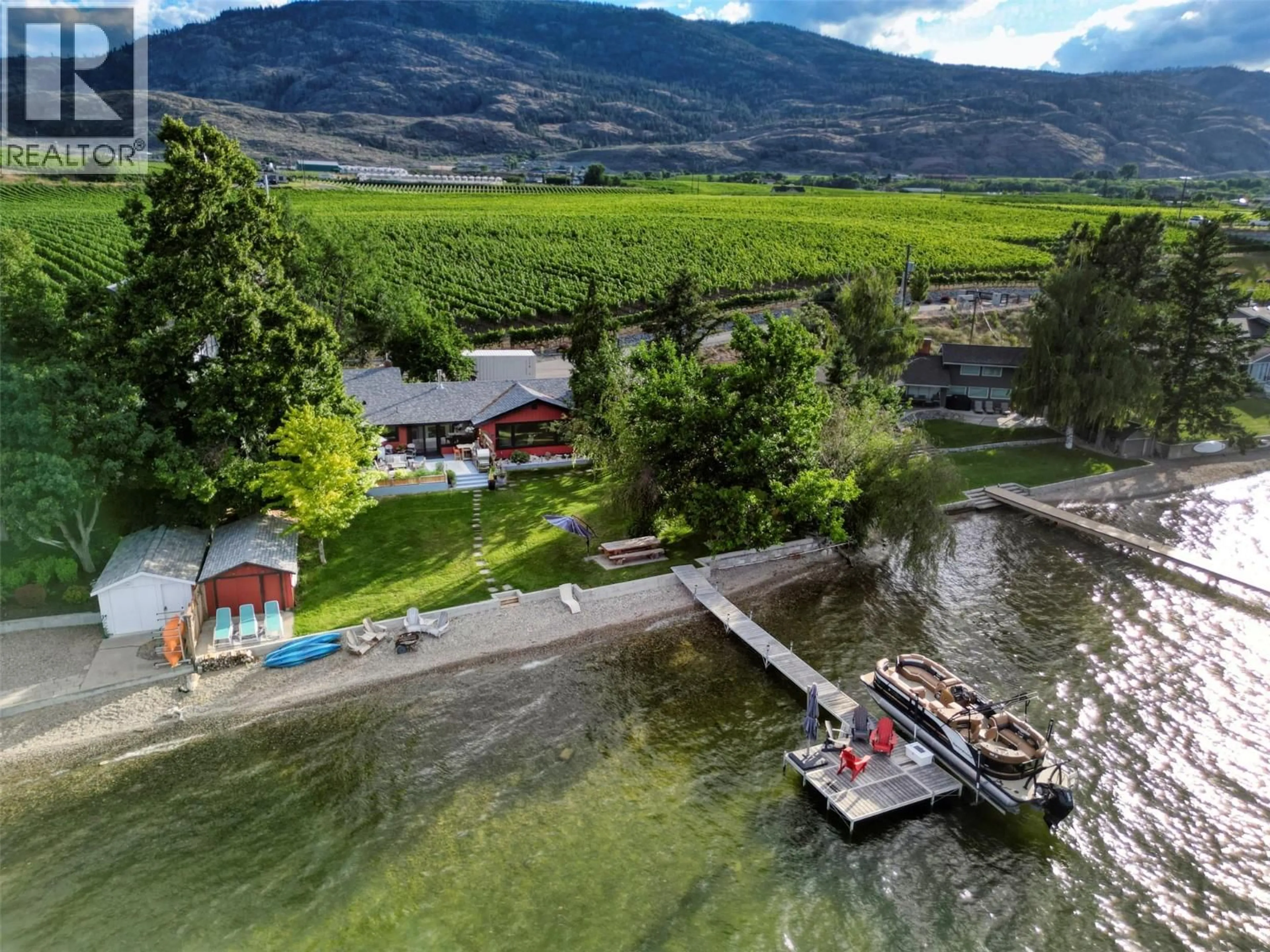 A pic from outside/outdoor area/front of a property/back of a property/a pic from drone, water/lake/river/ocean view for 10617 81ST STREET, Osoyoos British Columbia V0H1V2