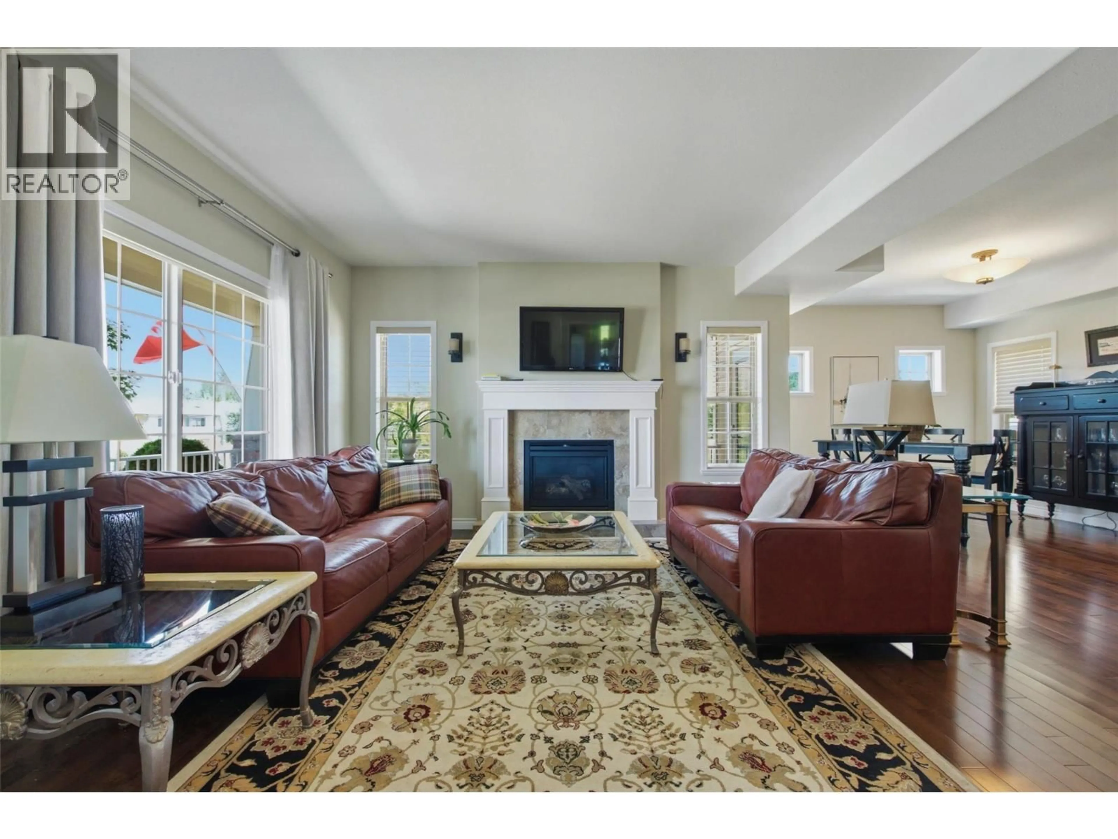 Living room with furniture, ceramic/tile floor for 2249 WILKINSON STREET, Kelowna British Columbia V1Y7Z1