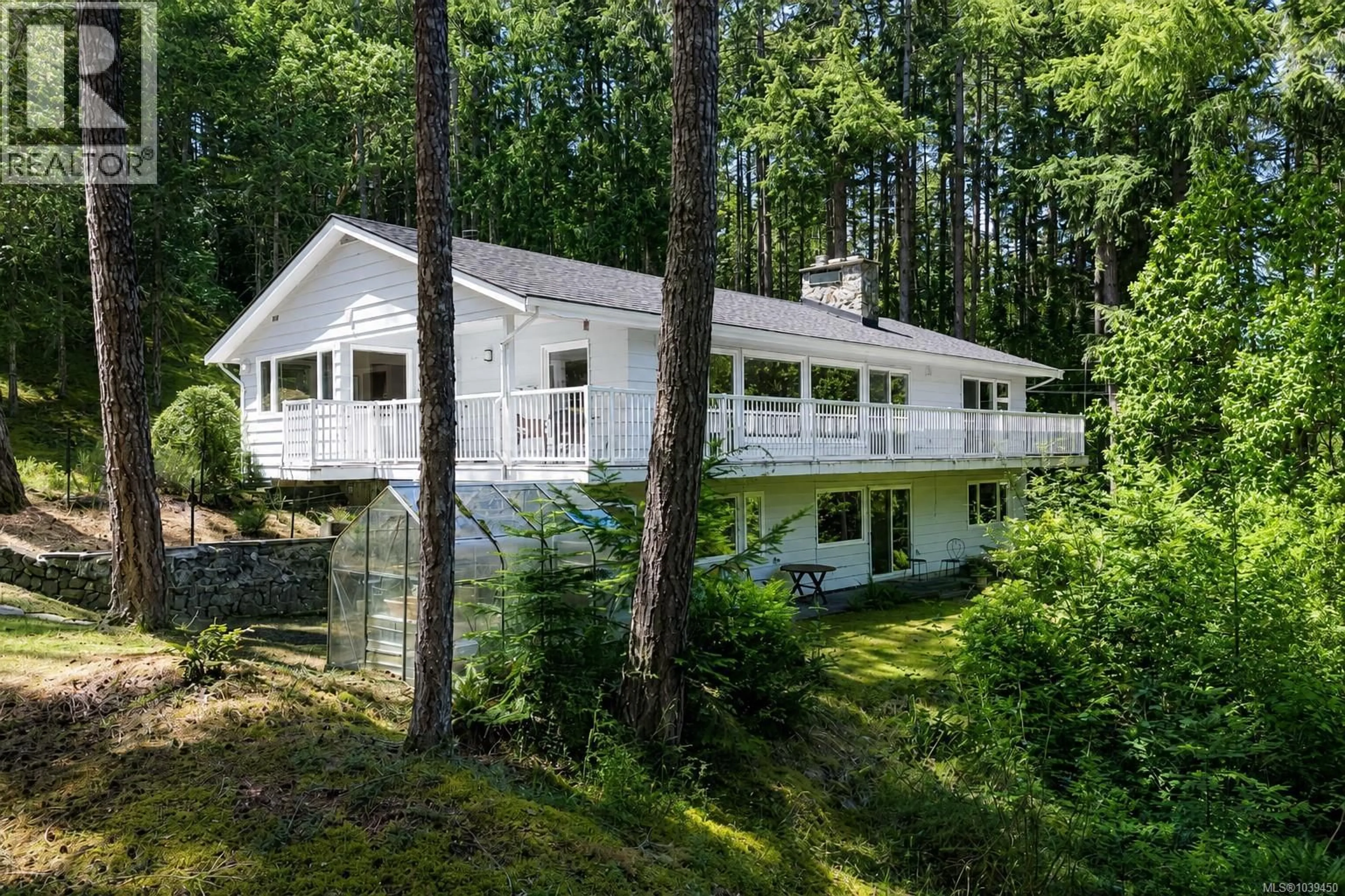 Home with vinyl exterior material, forest/trees view for 1495 LANDS END ROAD, North Saanich British Columbia V8L5L5