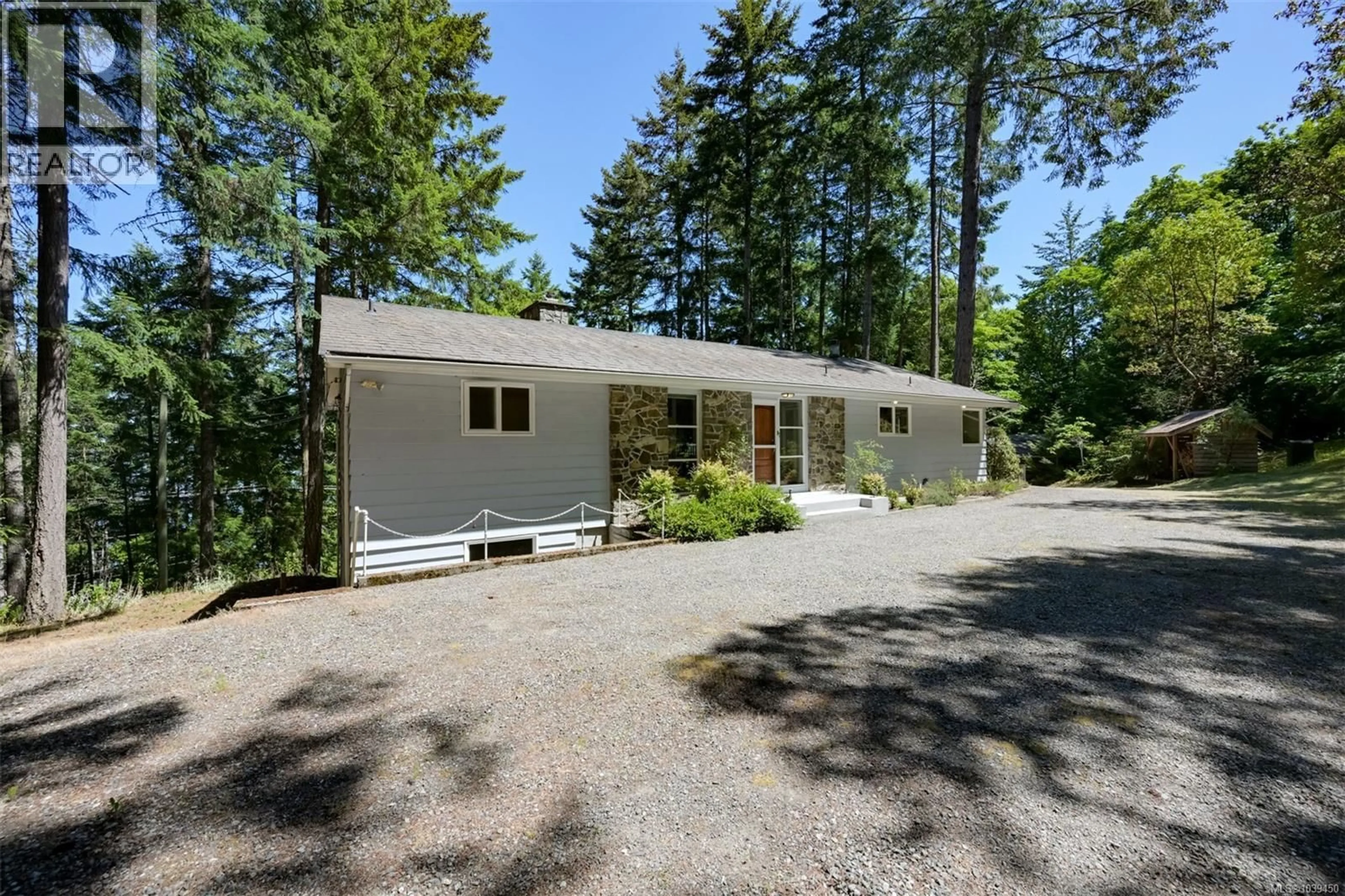 Home with vinyl exterior material, unknown for 1495 LANDS END ROAD, North Saanich British Columbia V8L5L5