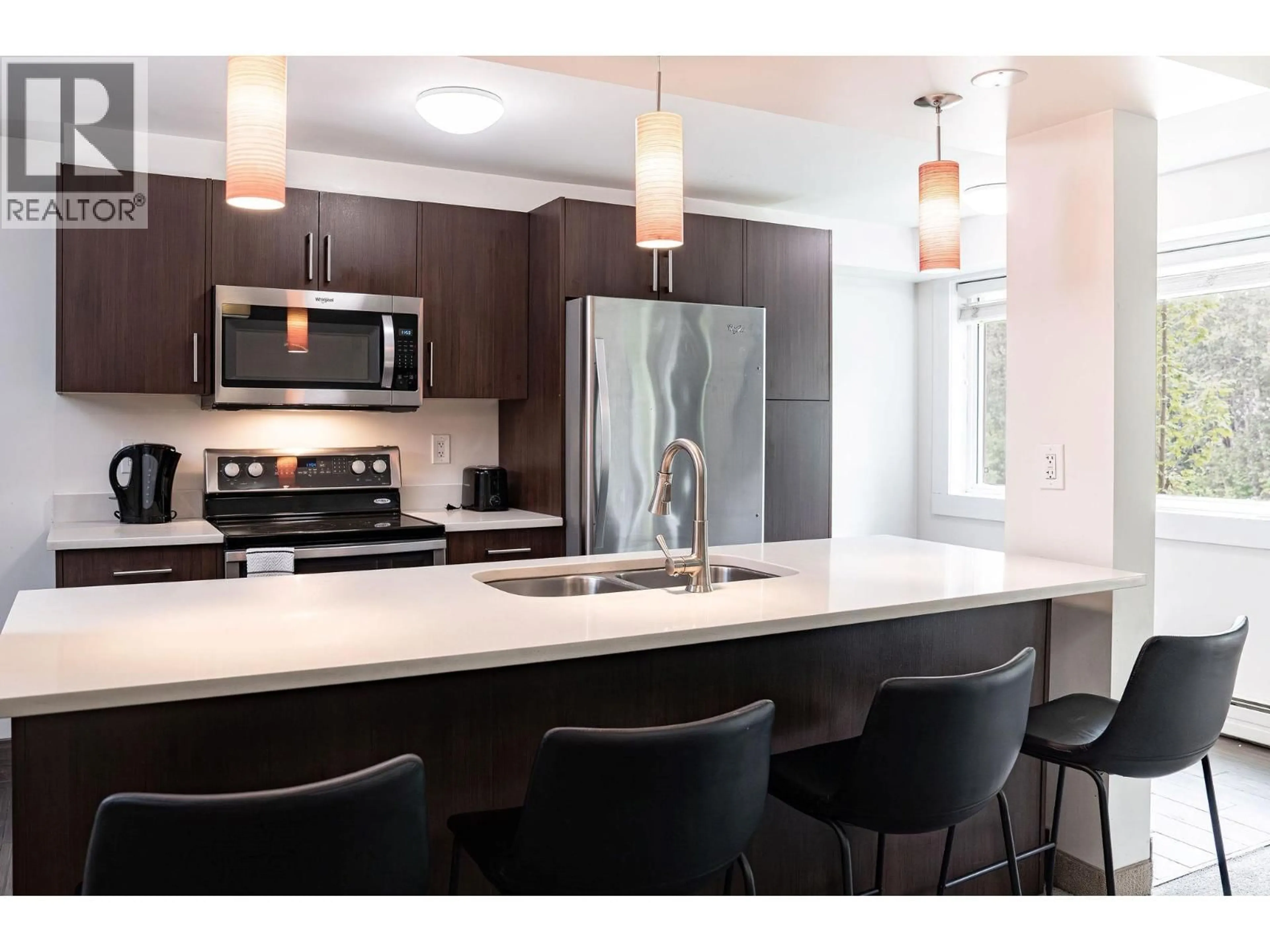 Contemporary kitchen, unknown for 104 - 1211 VICTORIA ROAD WEST, Revelstoke British Columbia V0E2S0