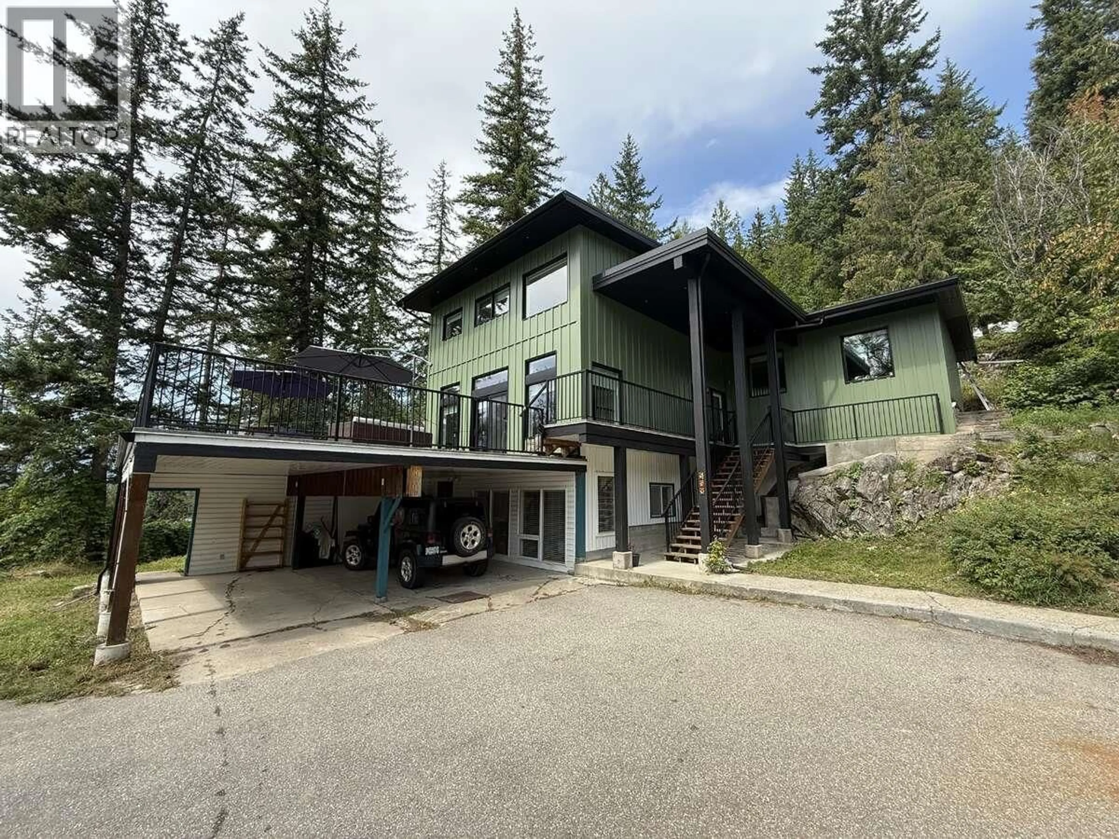 A pic from outside/outdoor area/front of a property/back of a property/a pic from drone, unknown for 588 ALPINE LANE EAST, Revelstoke British Columbia V0E2S0