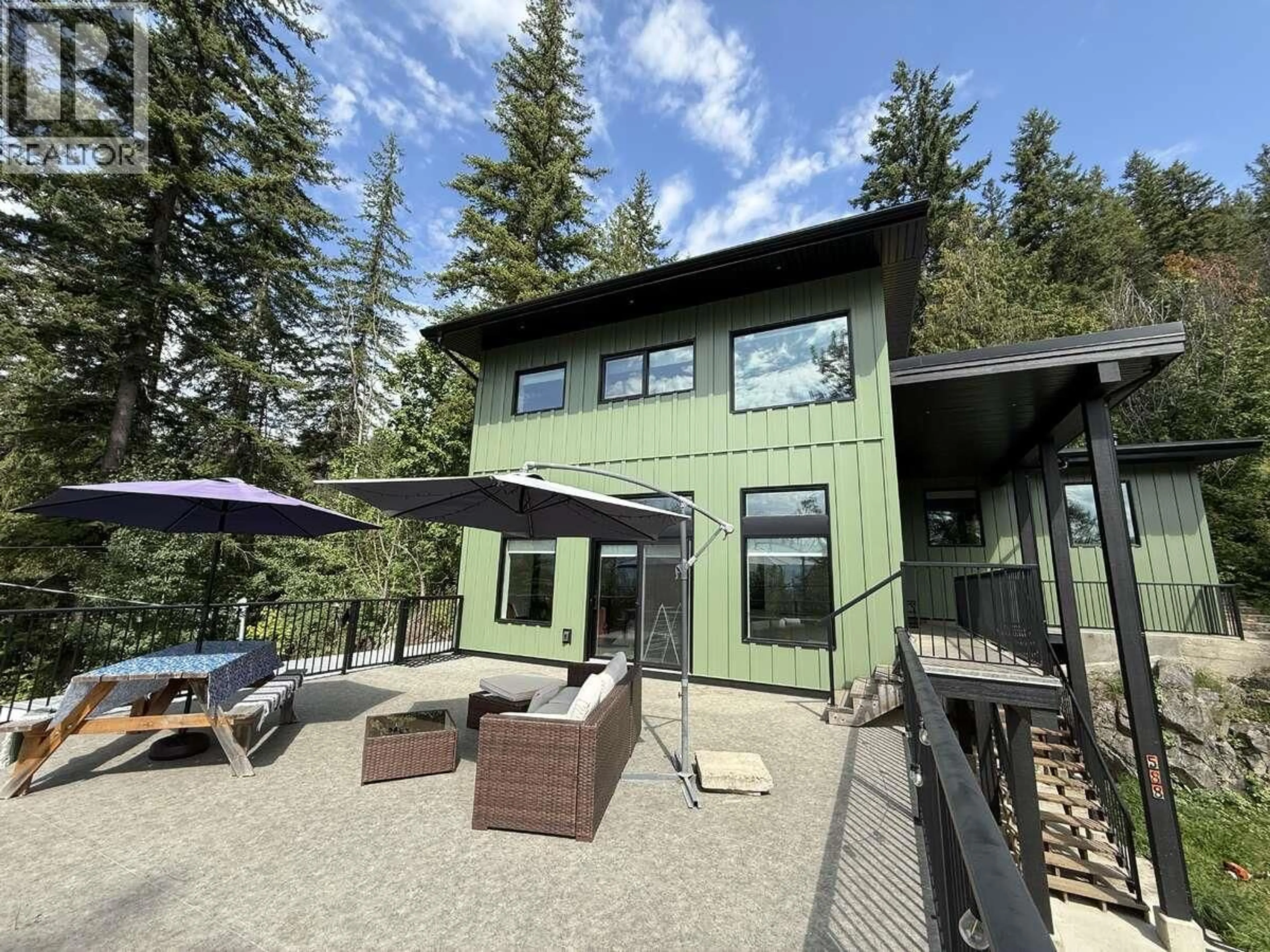 A pic from outside/outdoor area/front of a property/back of a property/a pic from drone, unknown for 588 ALPINE LANE EAST, Revelstoke British Columbia V0E2S0
