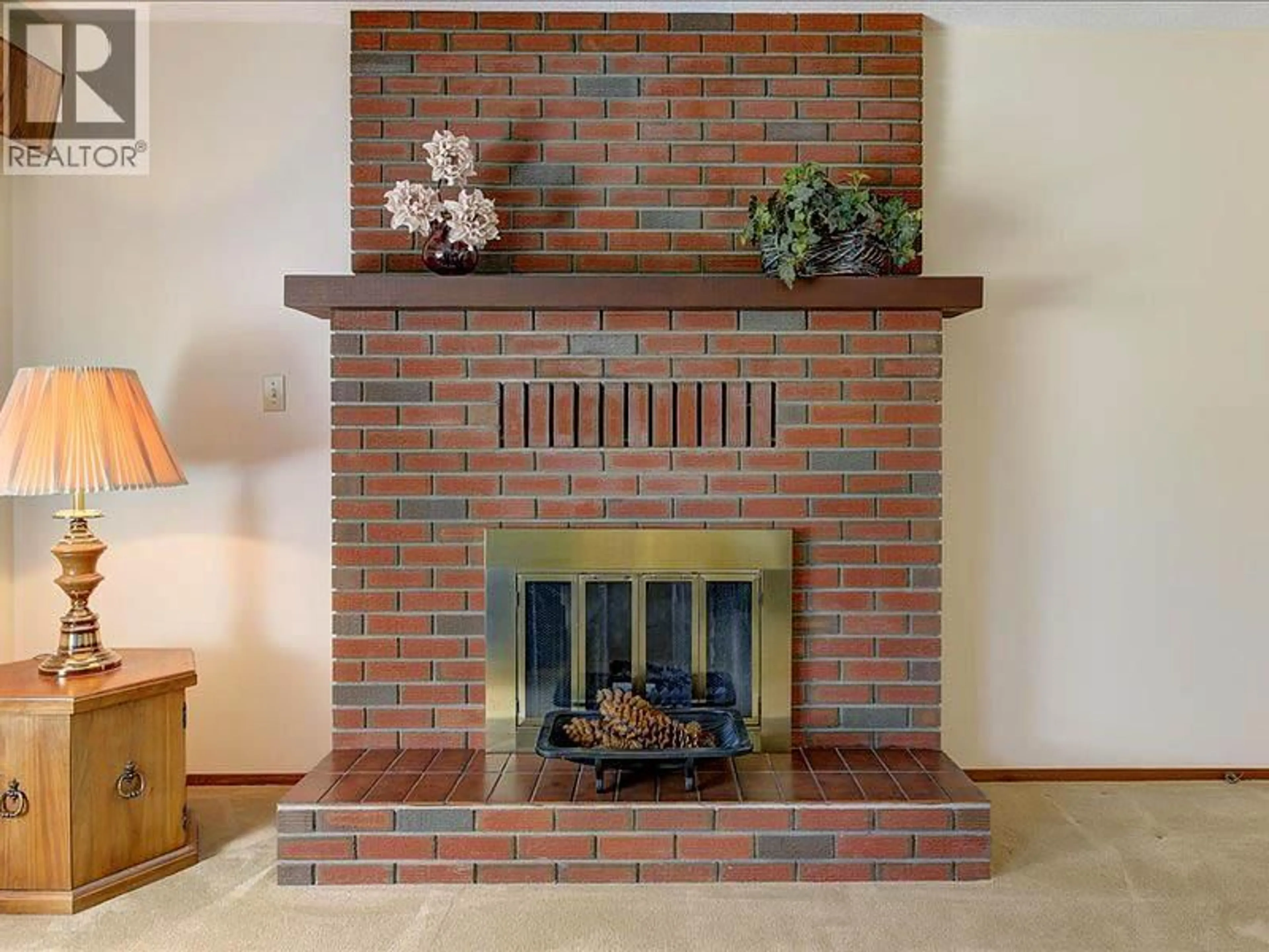 Home with brick exterior material, street for 2434 RHONDDA CRESCENT, Kelowna British Columbia V1Y8A3