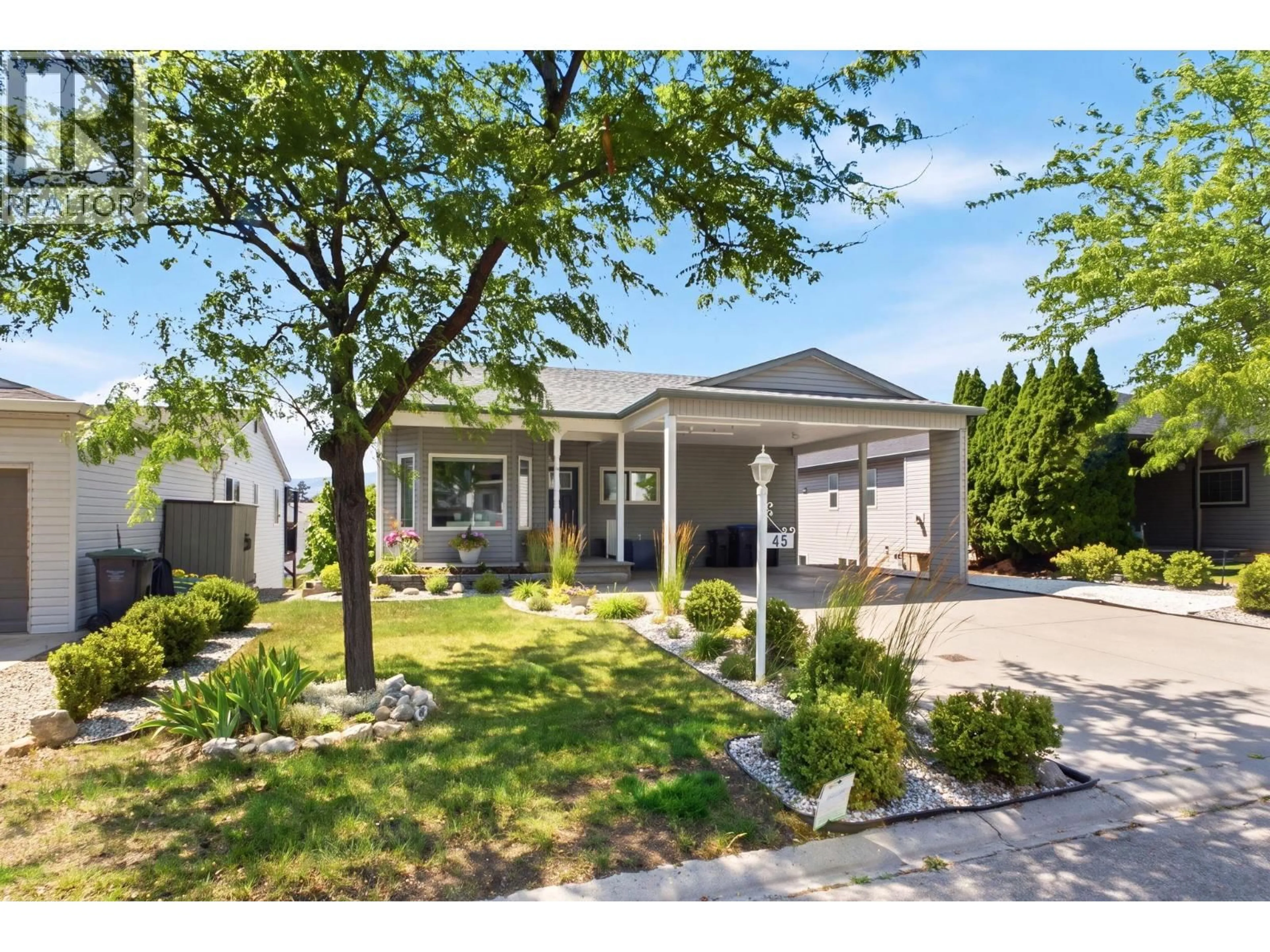 Home with vinyl exterior material, street for 45 - 6100 OLD VERNON ROAD, Kelowna British Columbia V1X7T8