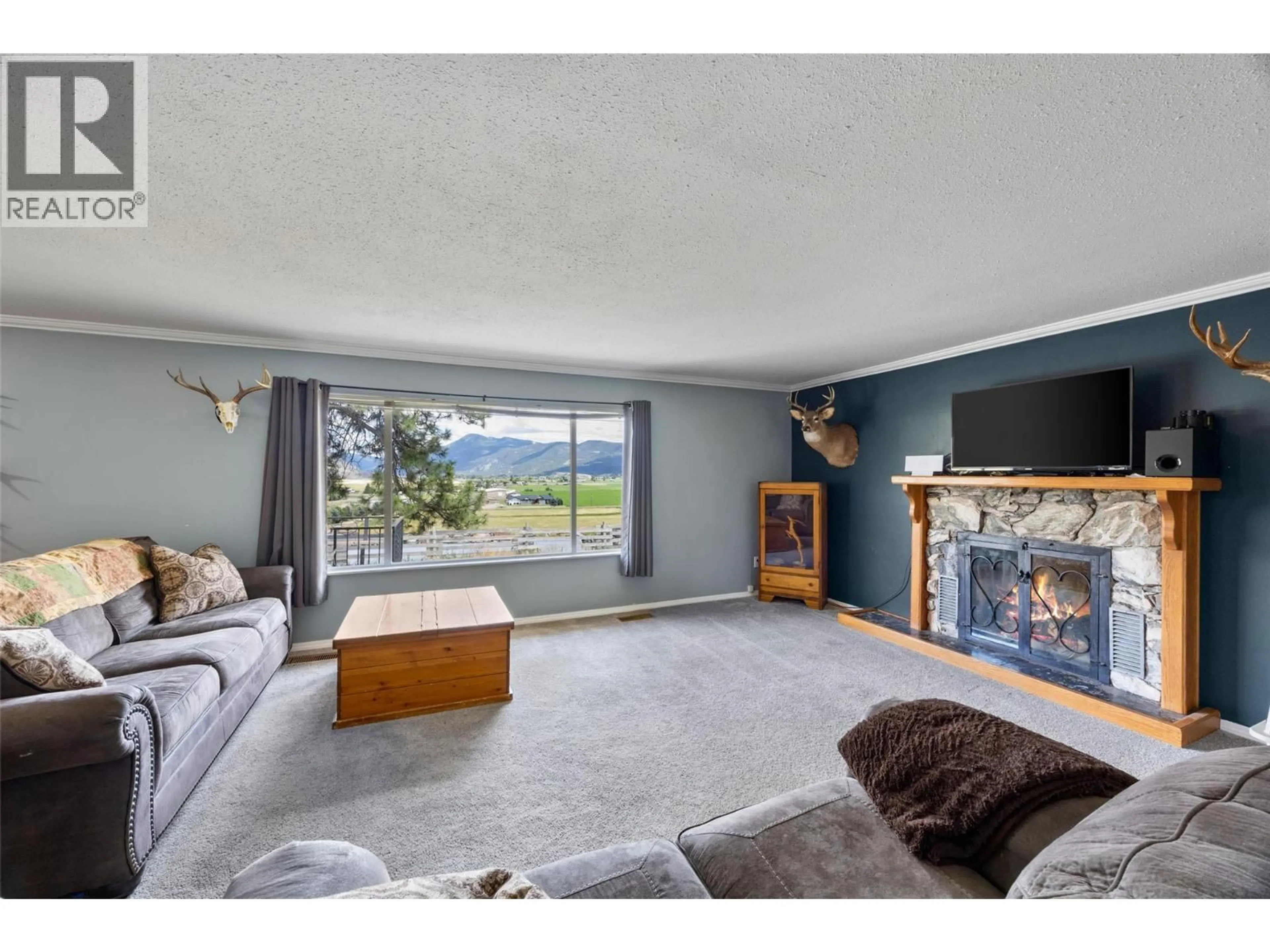 Living room with furniture, unknown for 6572 BECKER ROAD, Westwold British Columbia V0E3B1