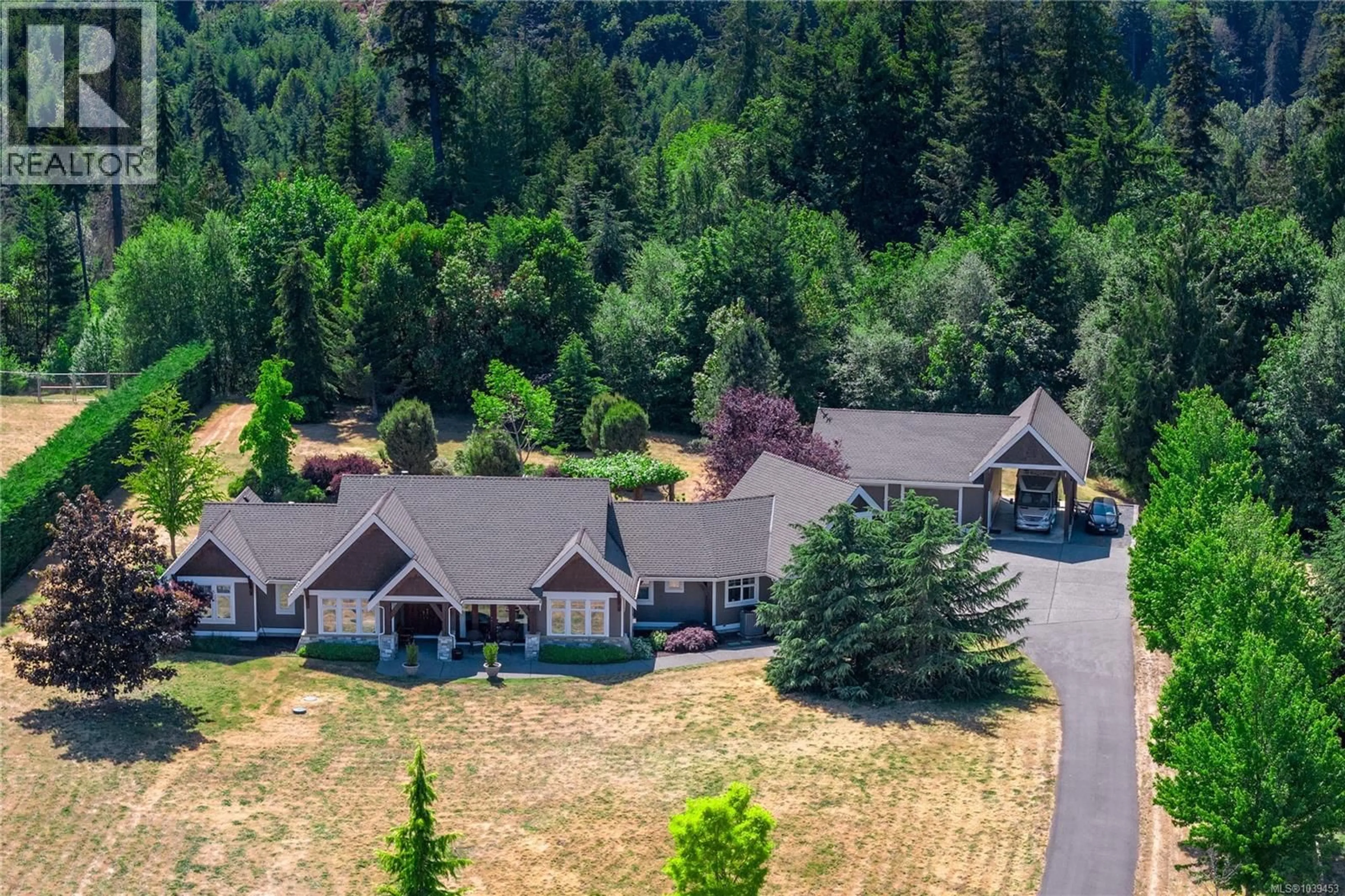 A pic from outside/outdoor area/front of a property/back of a property/a pic from drone, mountain view for 753 RIVERS EDGE DRIVE, Nanoose Bay British Columbia V9P9L5