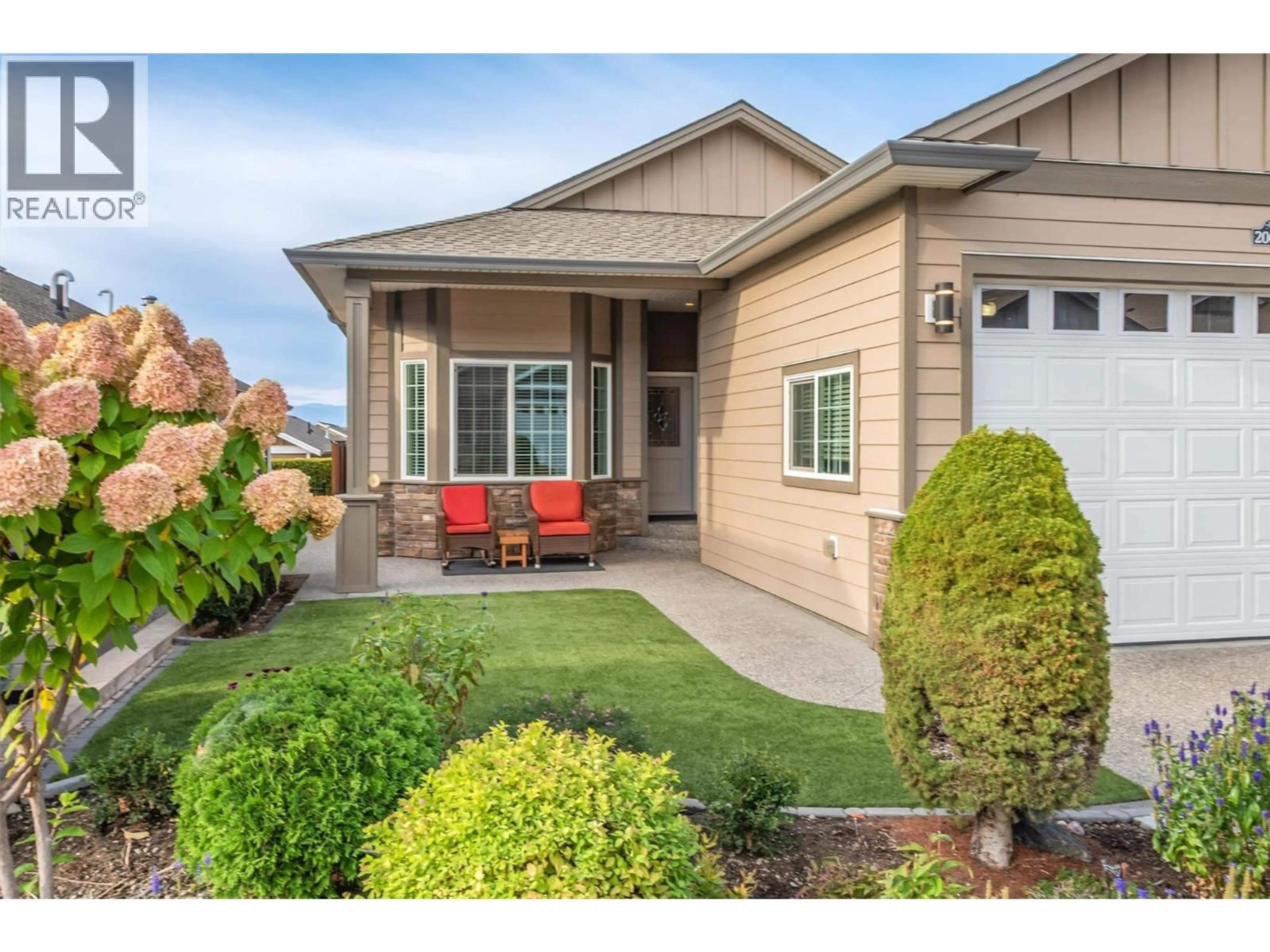 Home with vinyl exterior material, street for 2064 ASPEN DRIVE, West Kelowna British Columbia V4T3A5