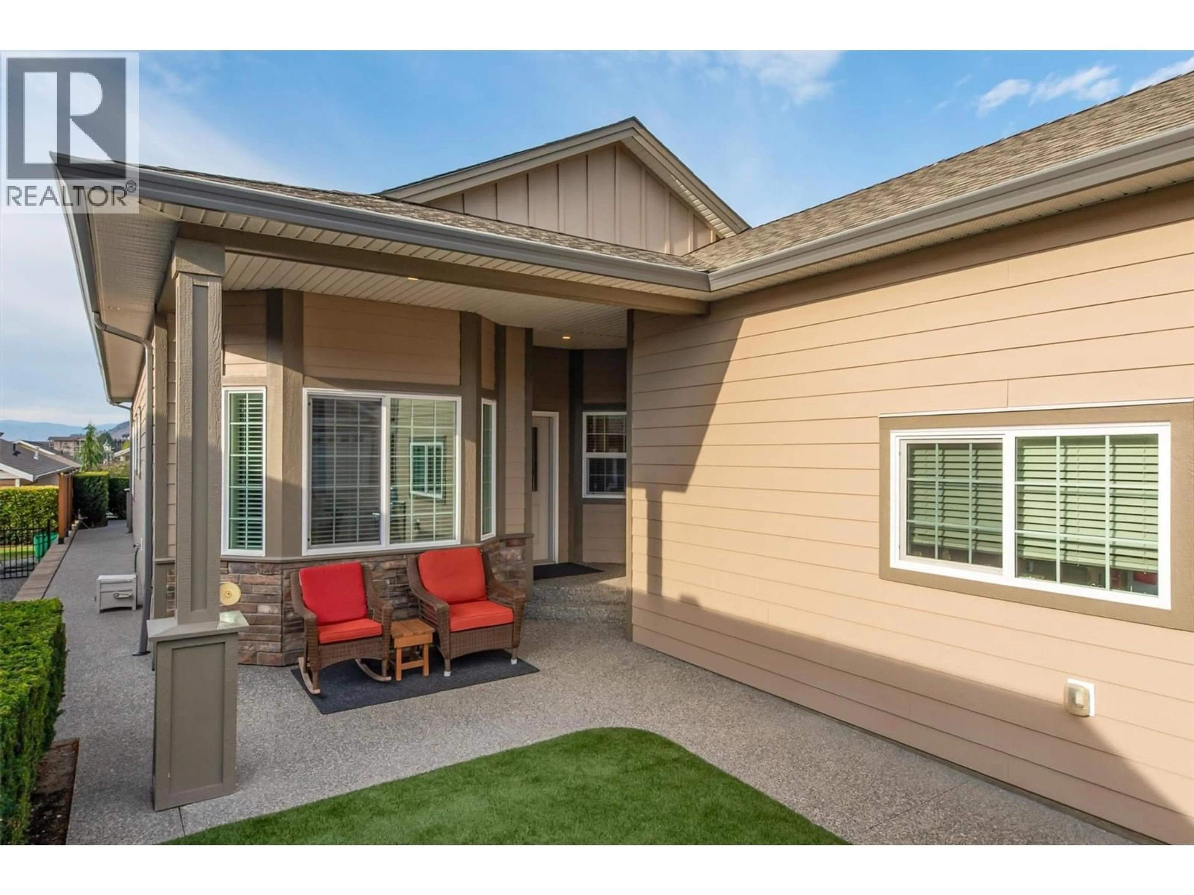 Home with vinyl exterior material, street for 2064 ASPEN DRIVE, West Kelowna British Columbia V4T3A5