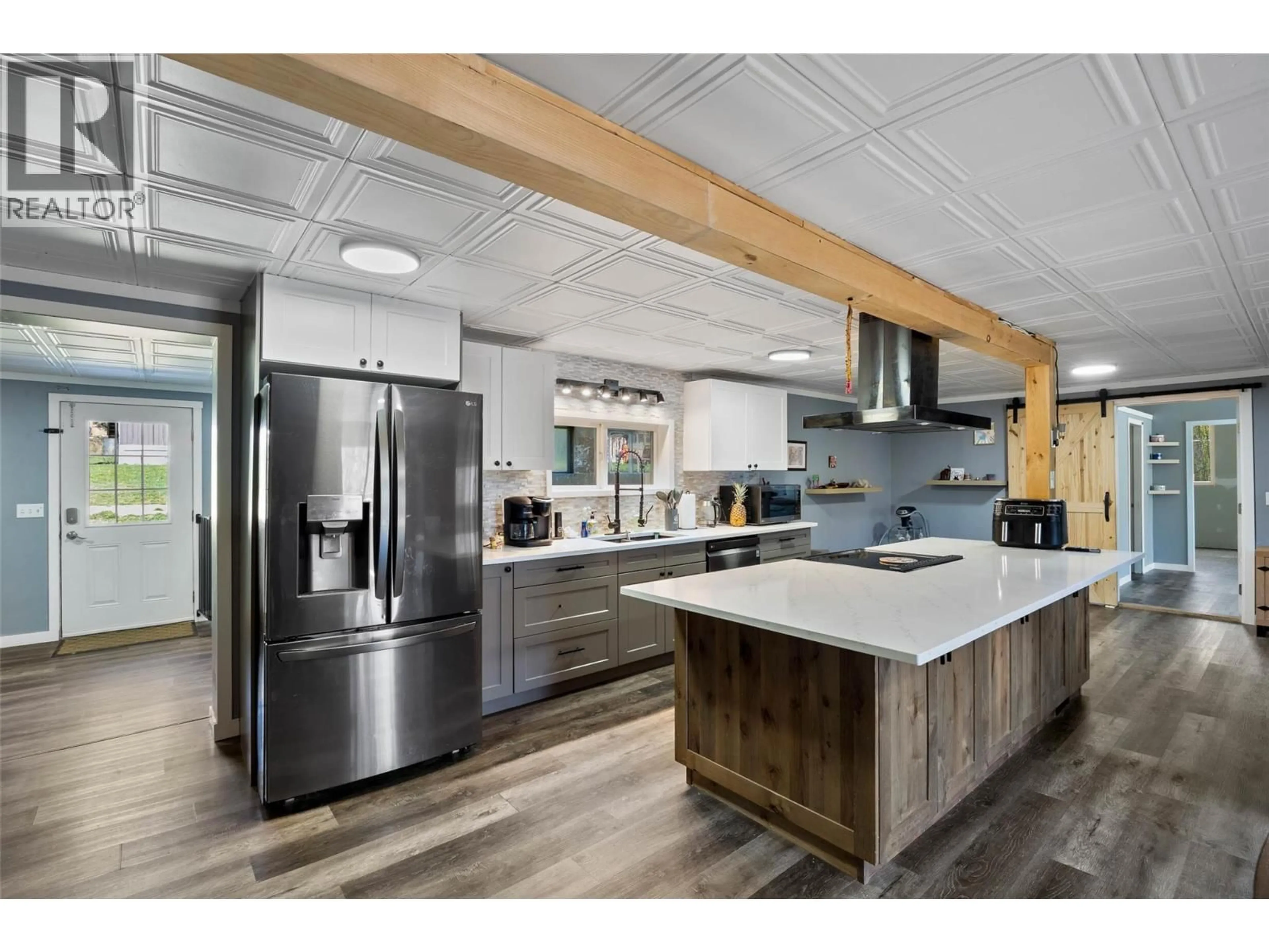 Open concept kitchen, wood/laminate floor for 2405 LLOYD ROAD, Clearwater British Columbia V0E1N1