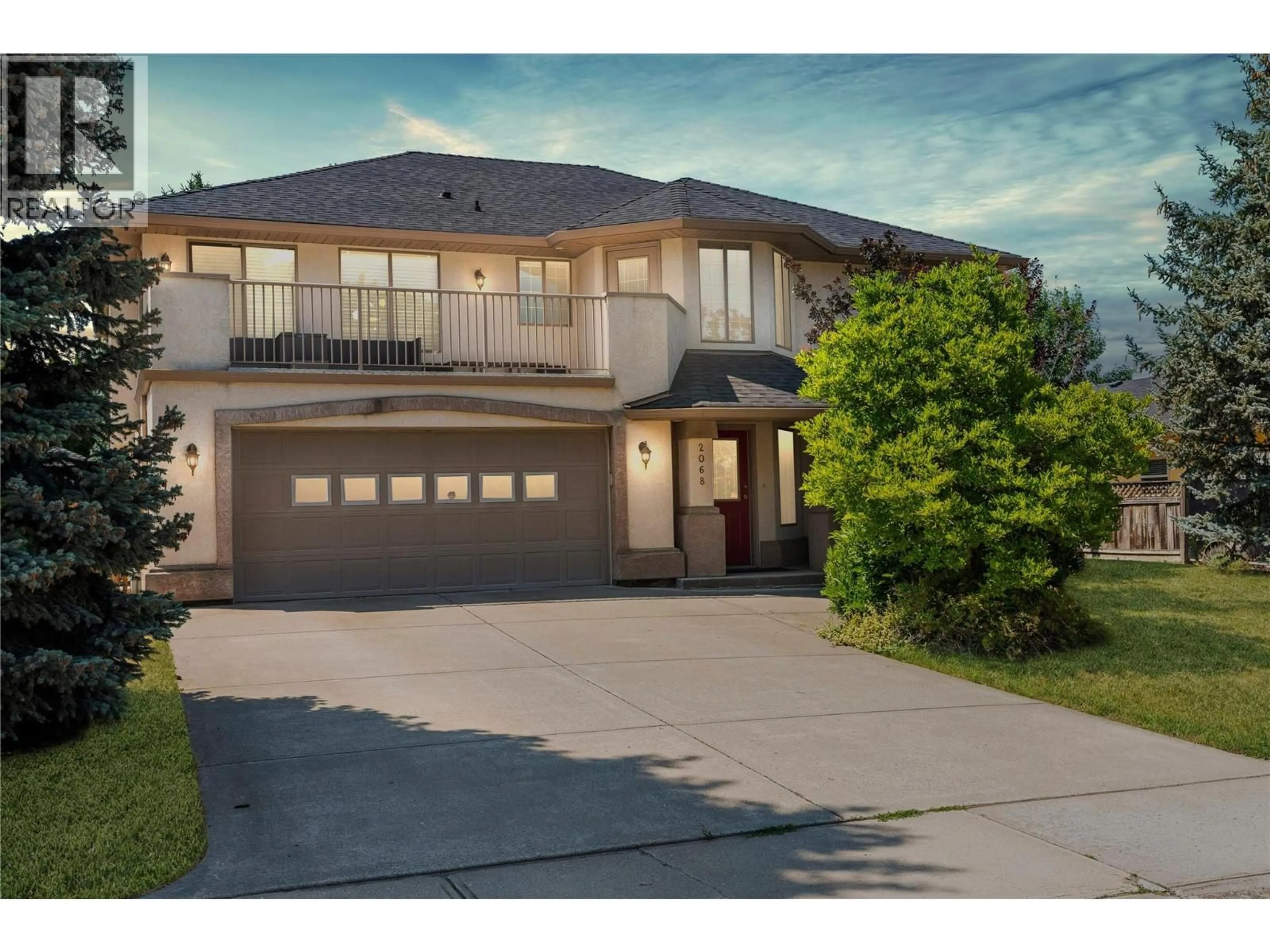 Home with vinyl exterior material, street for 2068 HUNTER CRESCENT, Armstrong British Columbia V4Y0B9