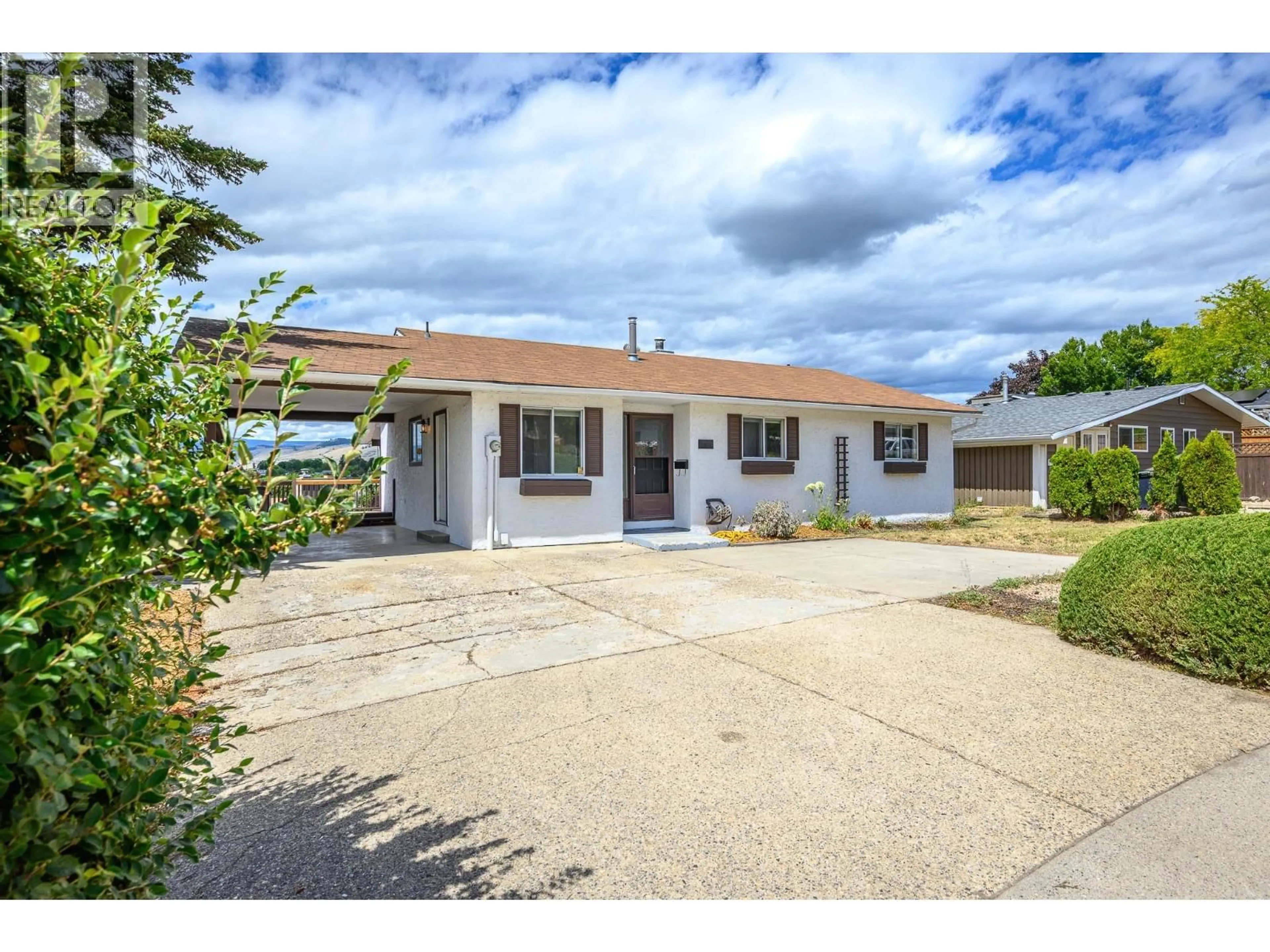 A pic from outside/outdoor area/front of a property/back of a property/a pic from drone, street for 2604 12 STREET, Vernon British Columbia V1T7Y7