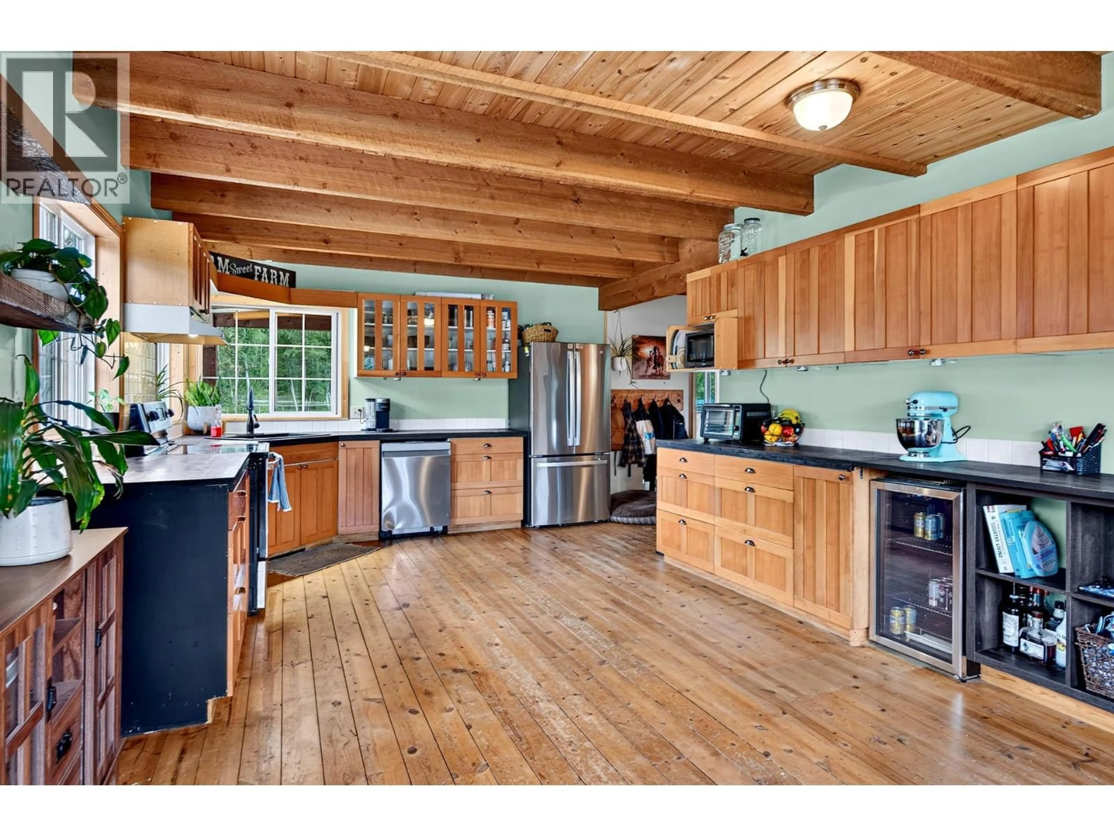 Rustic kitchen, wood/laminate floor for 230 SUNSHINE VALLEY ROAD, Clearwater British Columbia V0E1N2