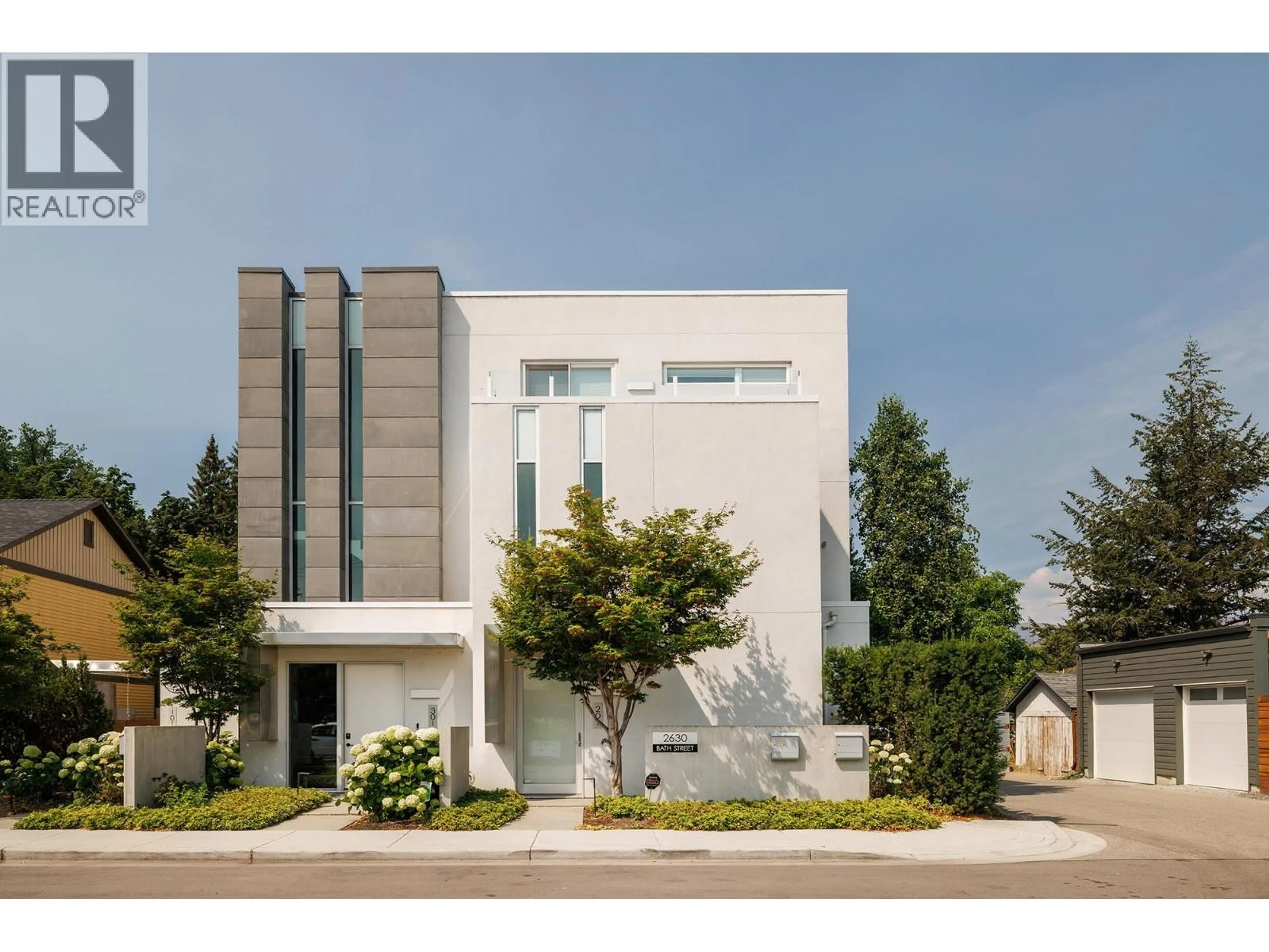 Home with brick exterior material, street for 201 - 2630 BATH STREET, Kelowna British Columbia V1Y1M2