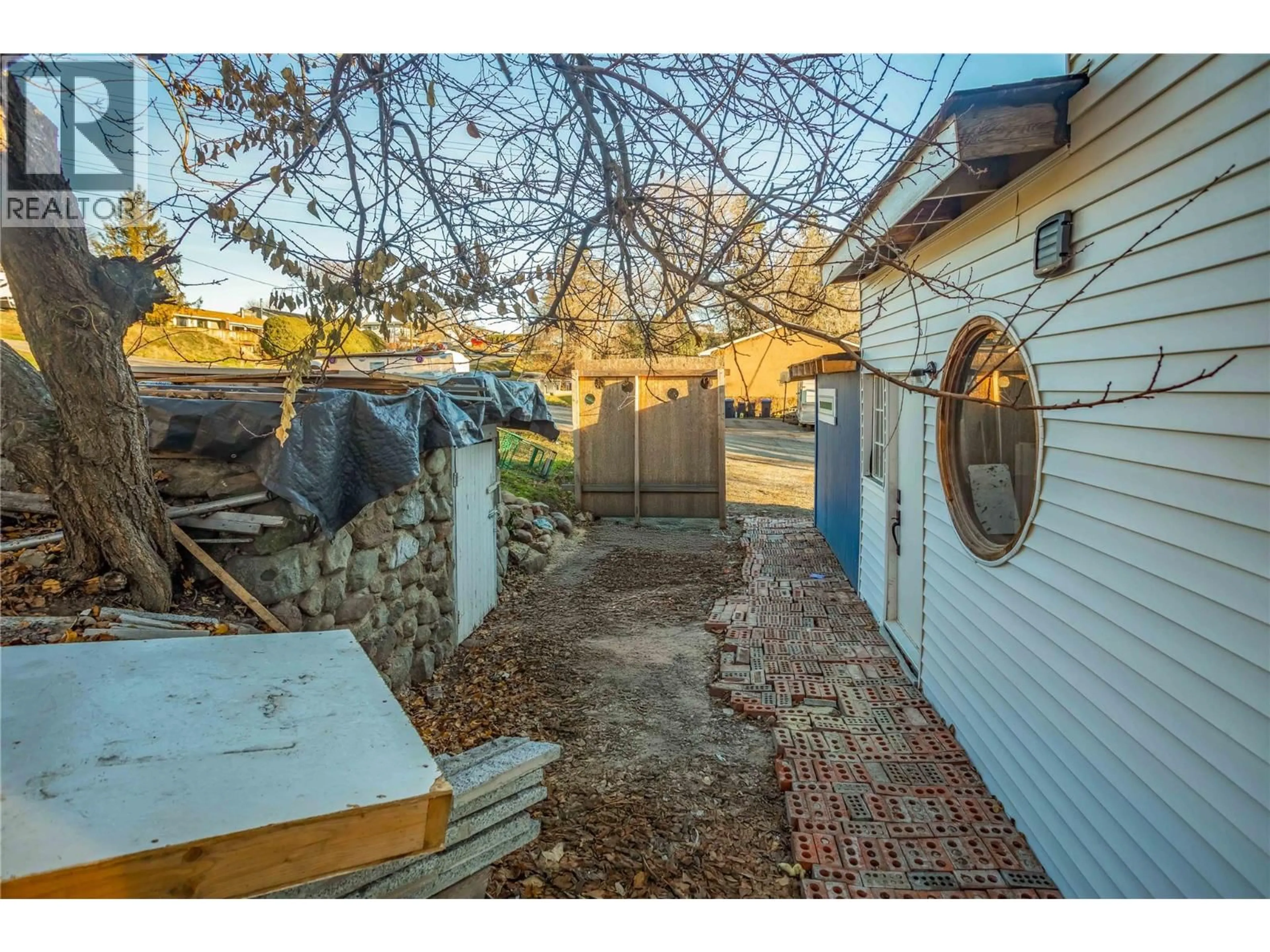 A pic from outside/outdoor area/front of a property/back of a property/a pic from drone, street for 3422 BROADVIEW ROAD, West Kelowna British Columbia V4T1P1