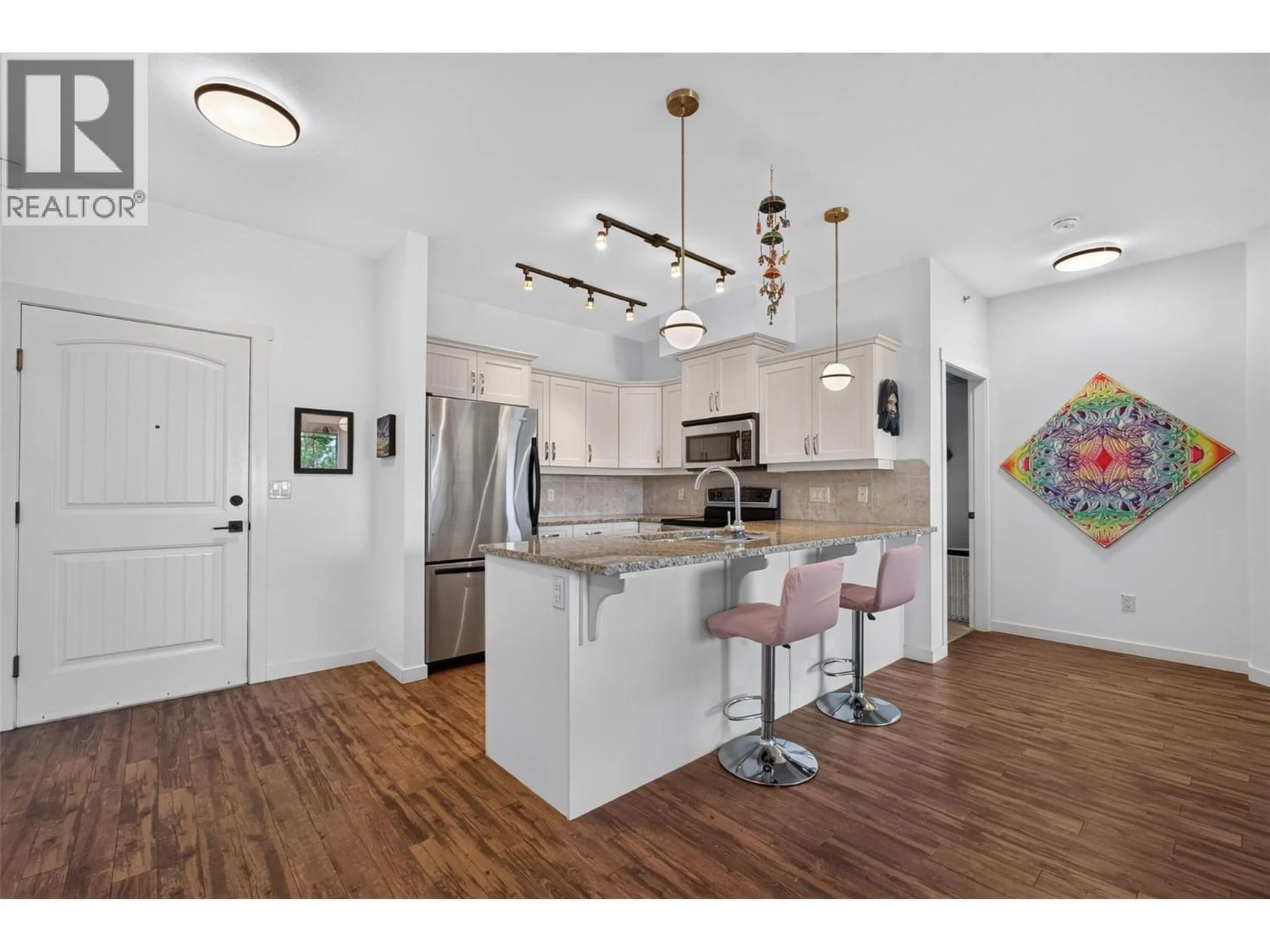 Open concept kitchen, unknown for 401 - 3739 CASORSO ROAD, Kelowna British Columbia V1W5E8