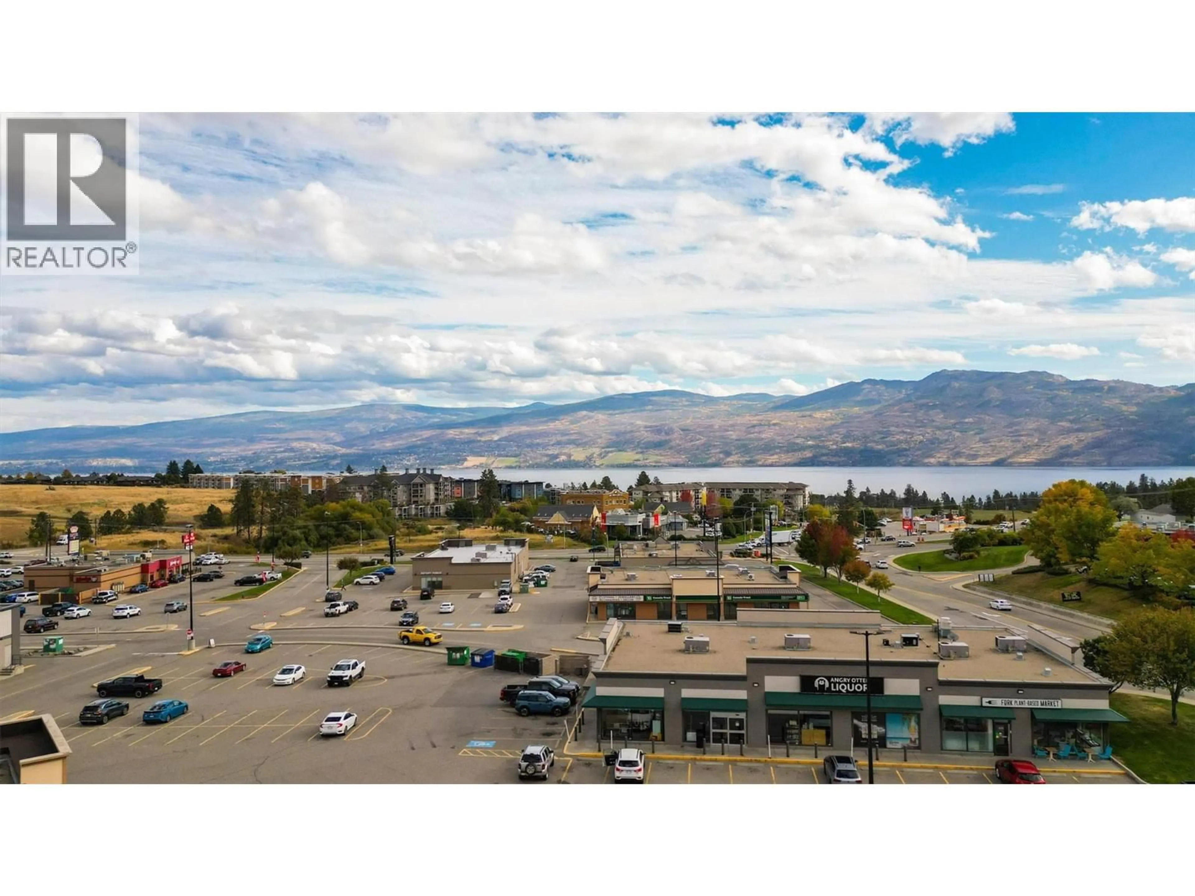 A pic from outside/outdoor area/front of a property/back of a property/a pic from drone, mountain view for 307 - 3645 GOSSET ROAD, West Kelowna British Columbia V1Z4C9