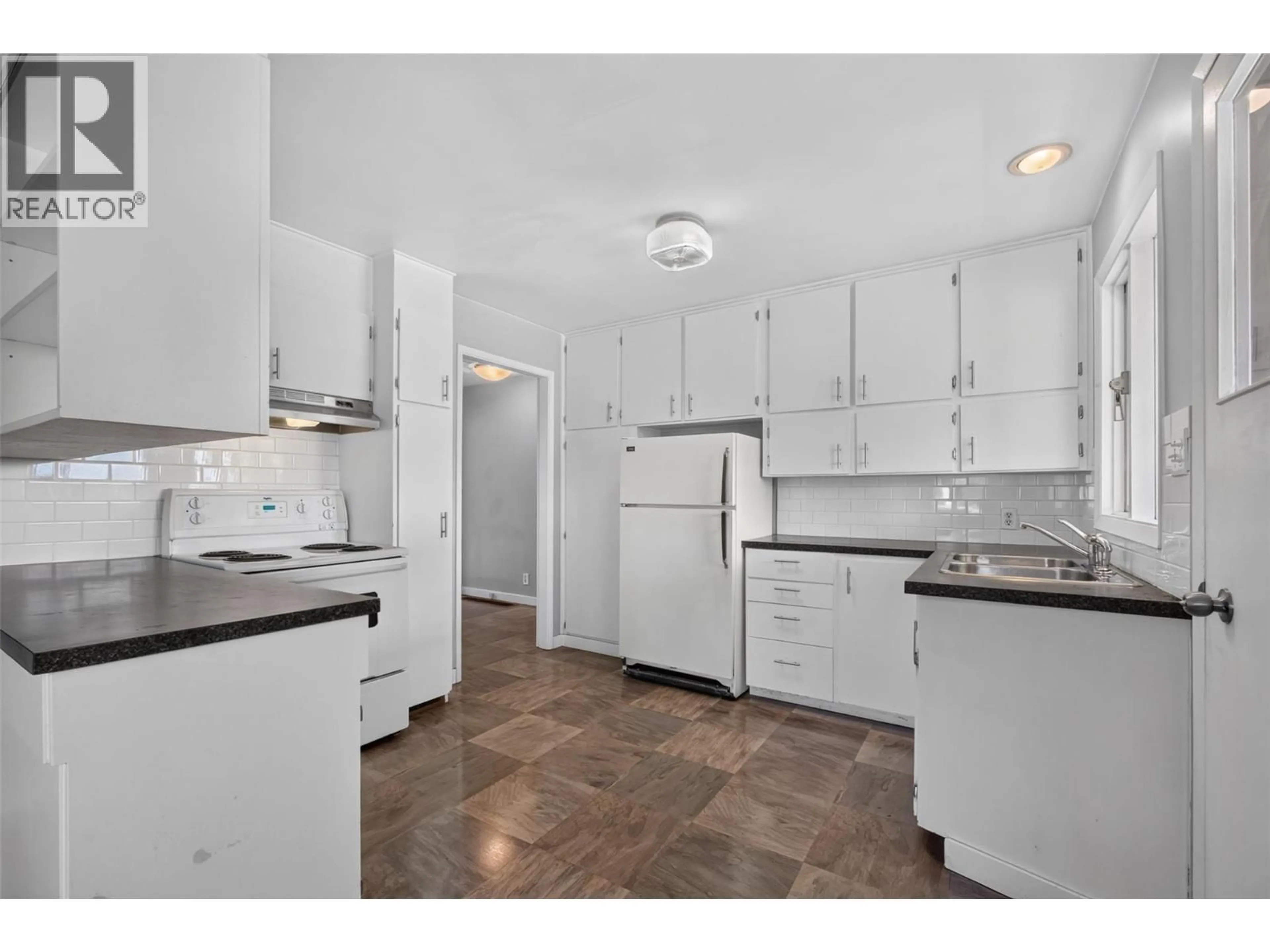 Standard kitchen, ceramic/tile floor for 3302 PLEASANT VALLEY ROAD, Vernon British Columbia V1T4L5