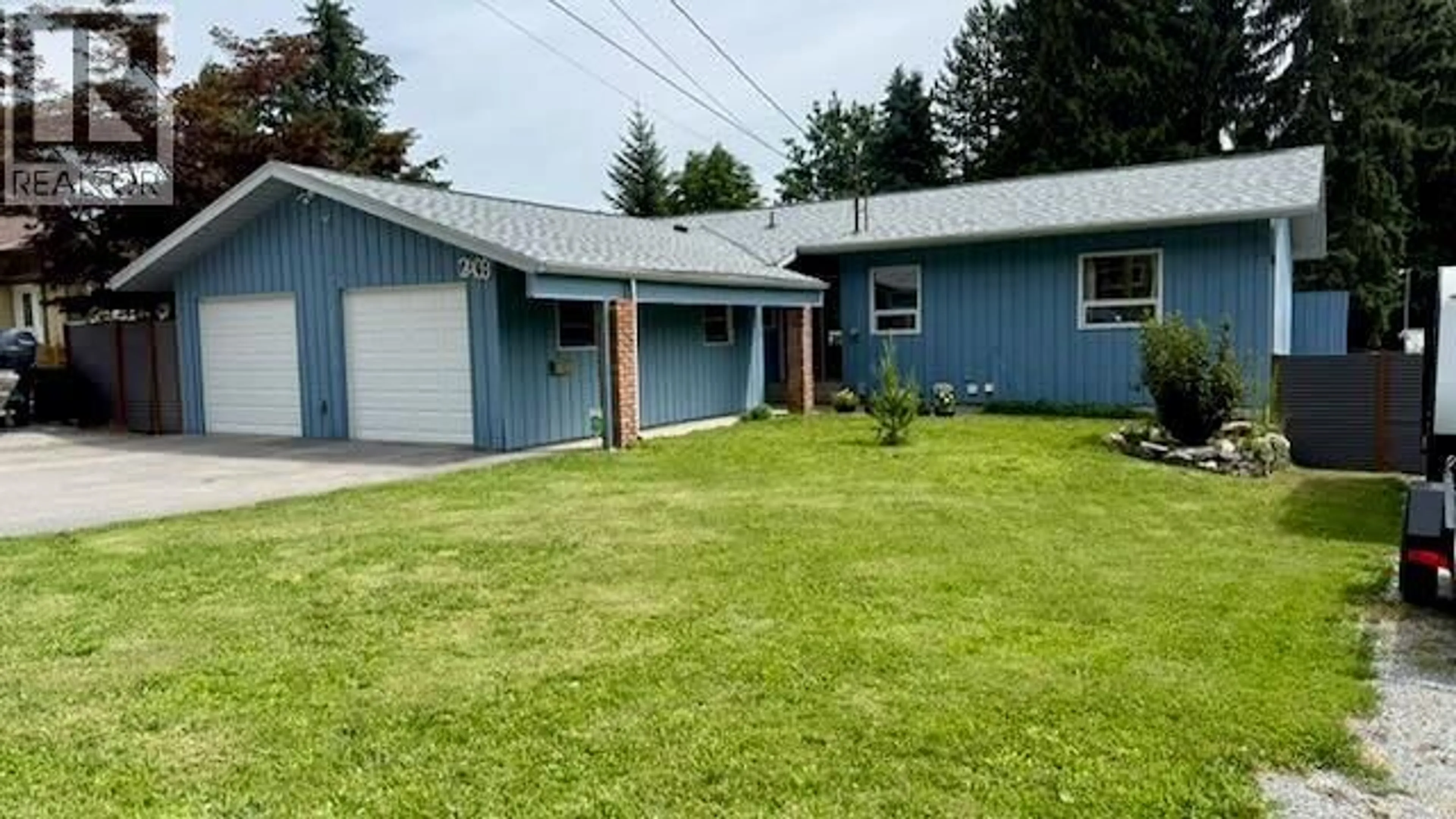 A pic from outside/outdoor area/front of a property/back of a property/a pic from drone, street for 2409 11TH AVENUE, Castlegar British Columbia V1N3B1