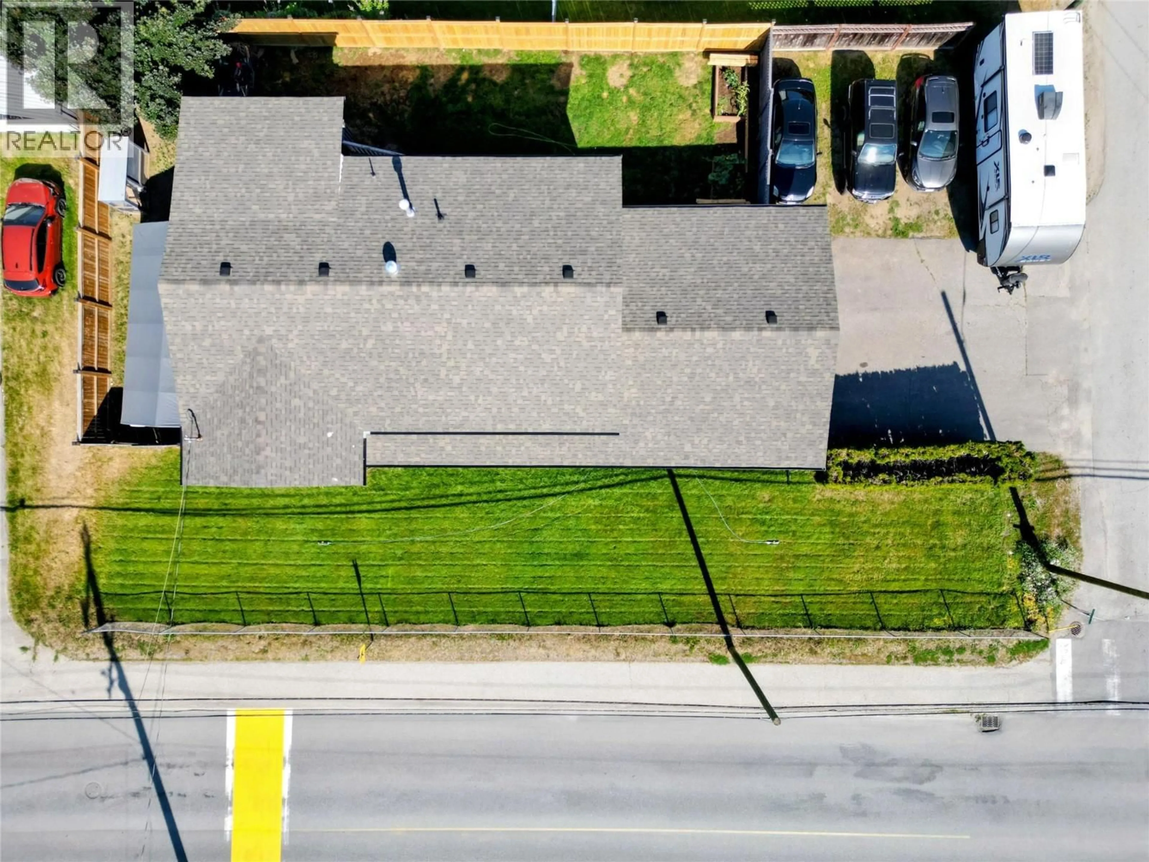 A pic from outside/outdoor area/front of a property/back of a property/a pic from drone, street for 1837 COLUMBIA GARDENS ROAD, Fruitvale British Columbia V0G1L0