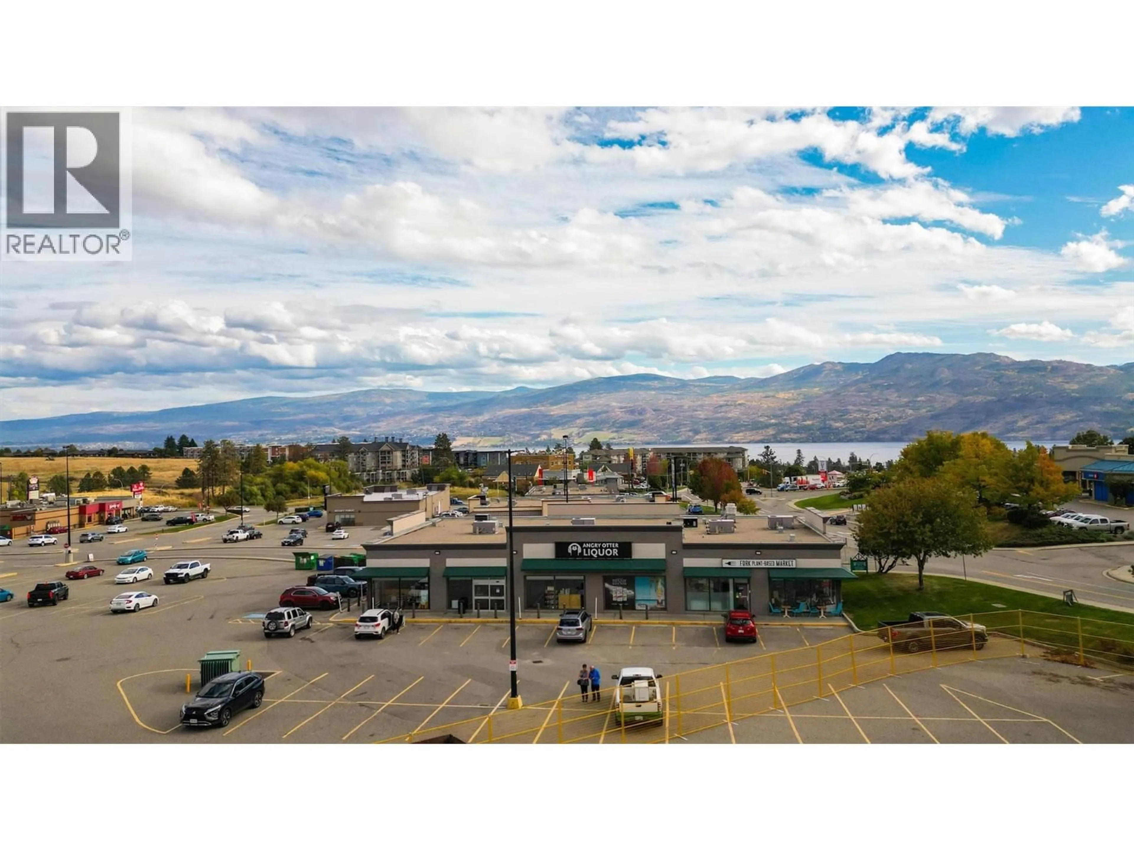 A pic from outside/outdoor area/front of a property/back of a property/a pic from drone, mountain view for 409 - 3645 GOSSET ROAD, West Kelowna British Columbia V1Z4C9