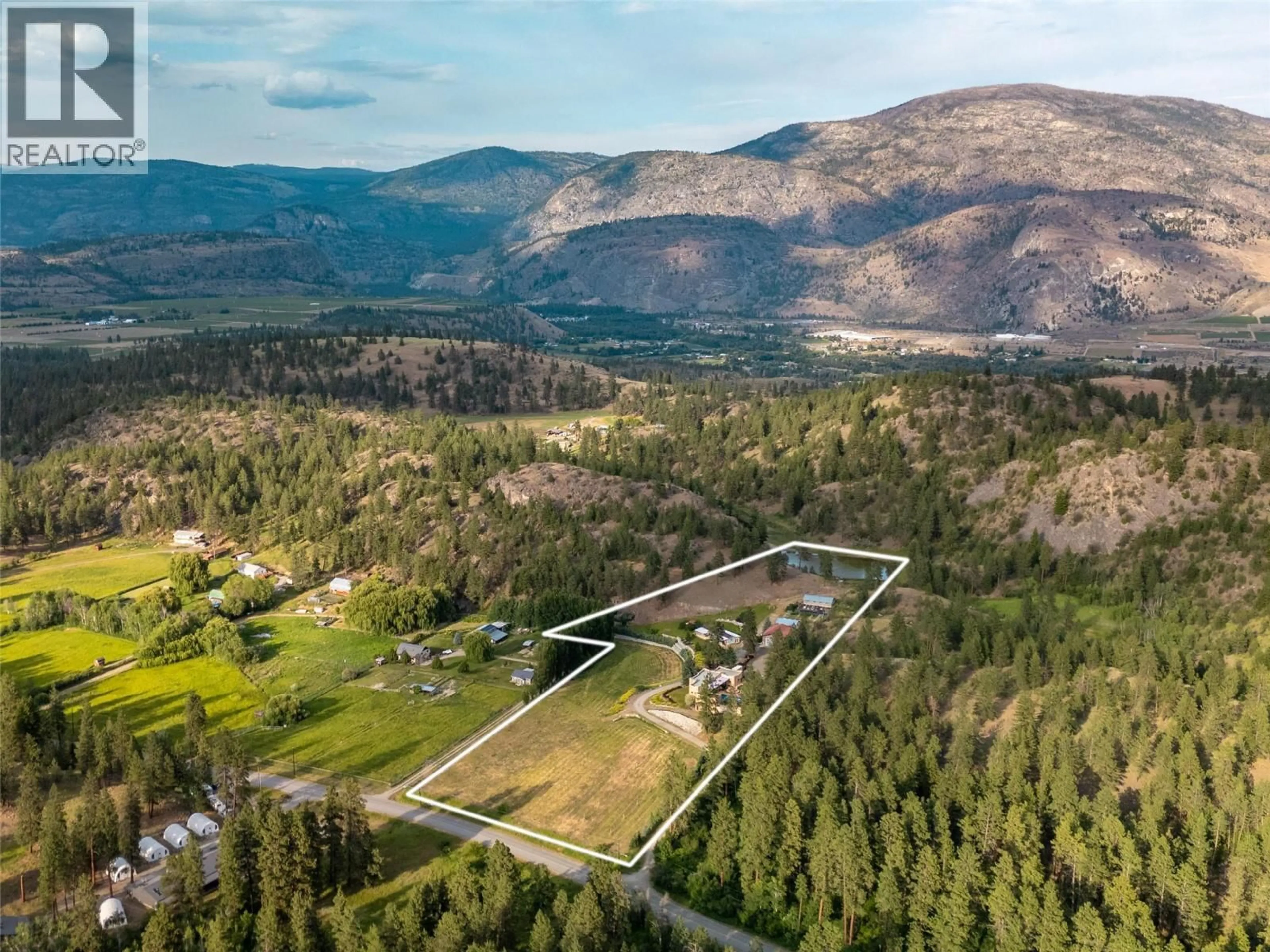 A pic from outside/outdoor area/front of a property/back of a property/a pic from drone, mountain view for 1788 WILLOWBROOK ROAD, Oliver British Columbia V0H1T5