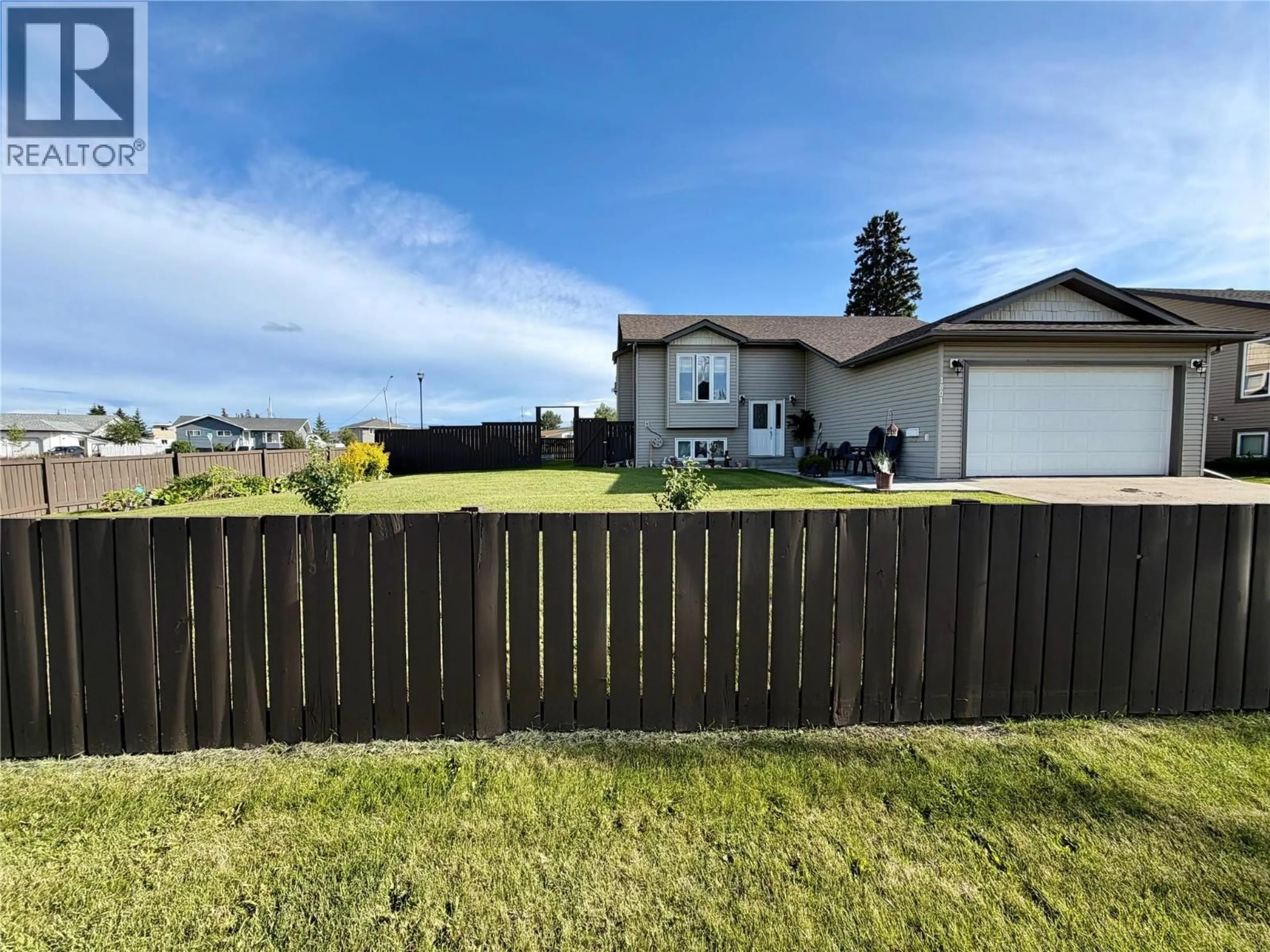 A pic from outside/outdoor area/front of a property/back of a property/a pic from drone, street for 1801 109 AVENUE, Dawson Creek British Columbia V1G2V6