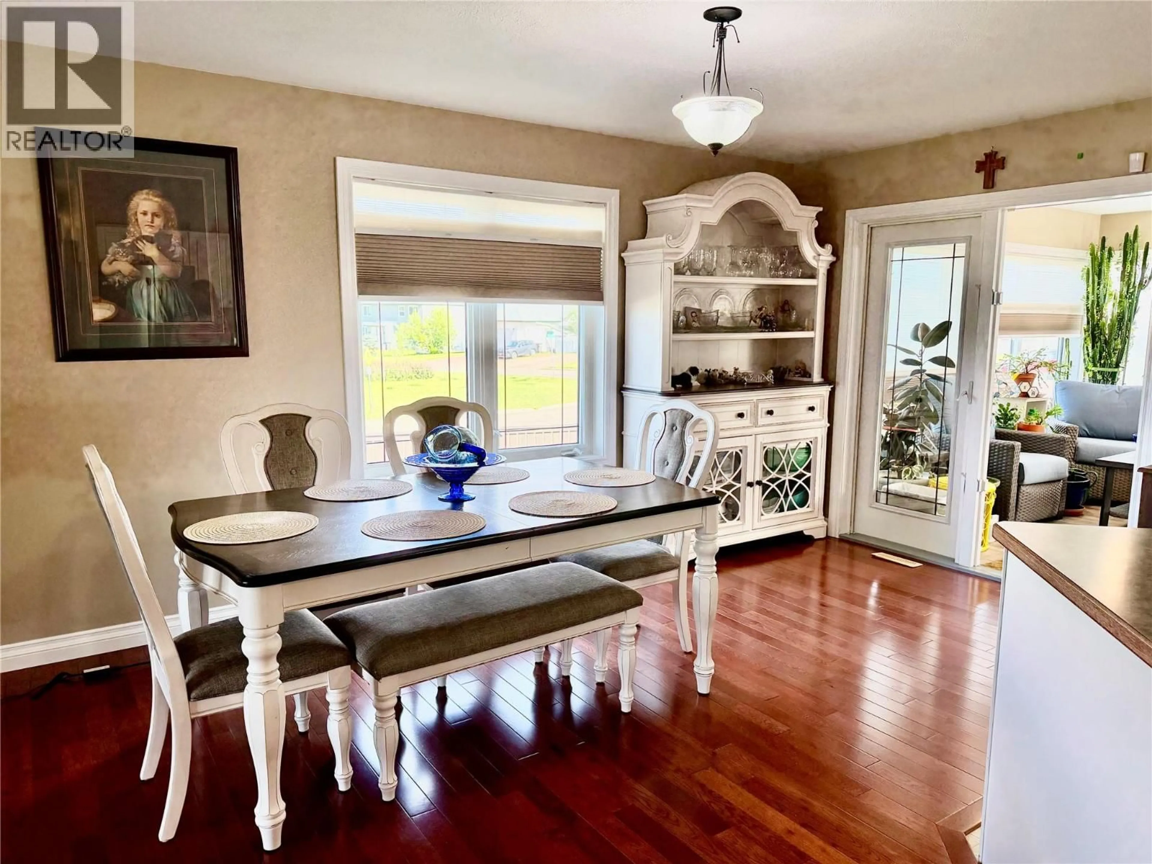 Dining room, wood/laminate floor for 1801 109 AVENUE, Dawson Creek British Columbia V1G2V6