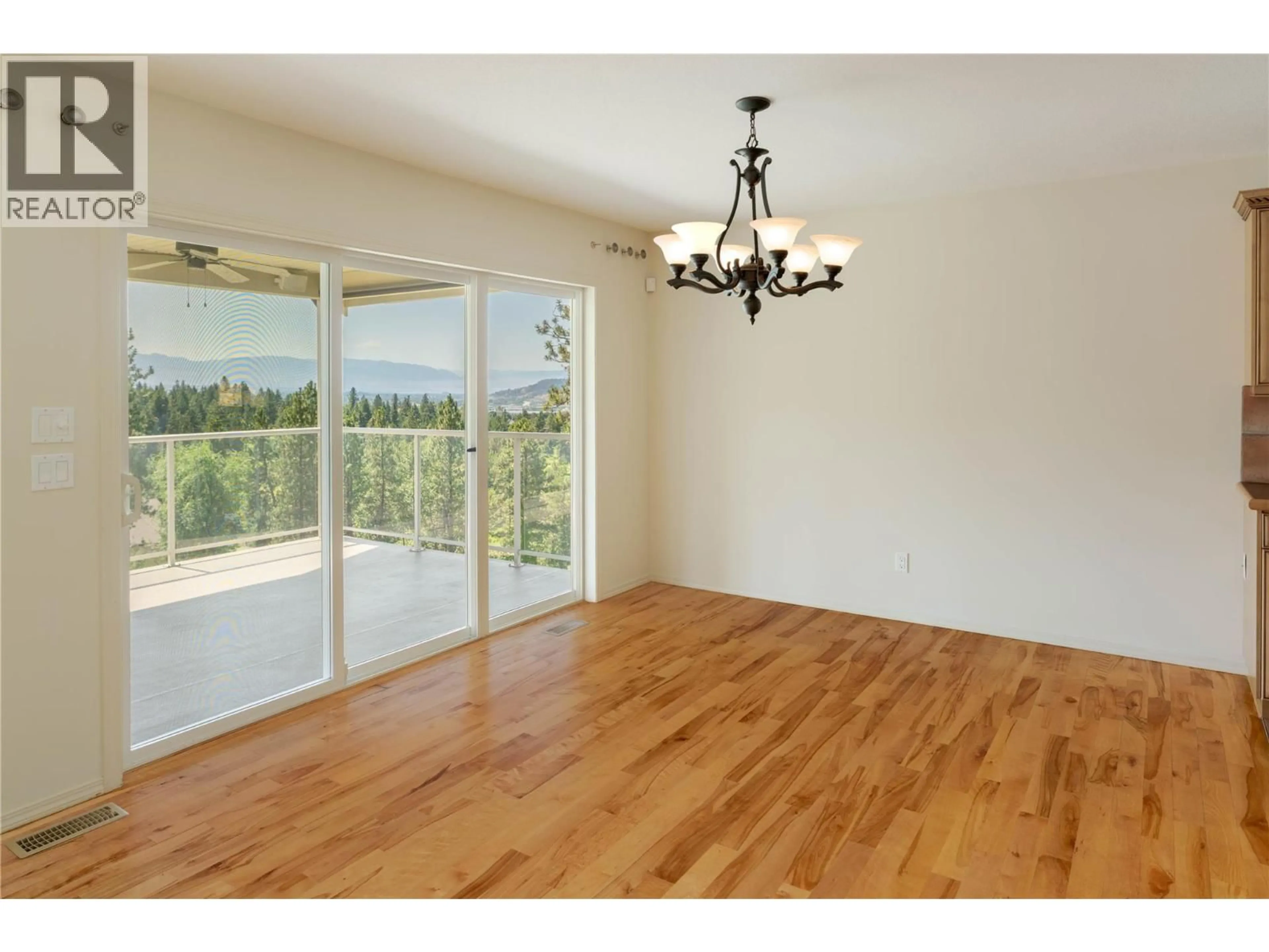 Dining room, wood/laminate floor for 5281 SILVERADO PLACE, Kelowna British Columbia V1X7X8