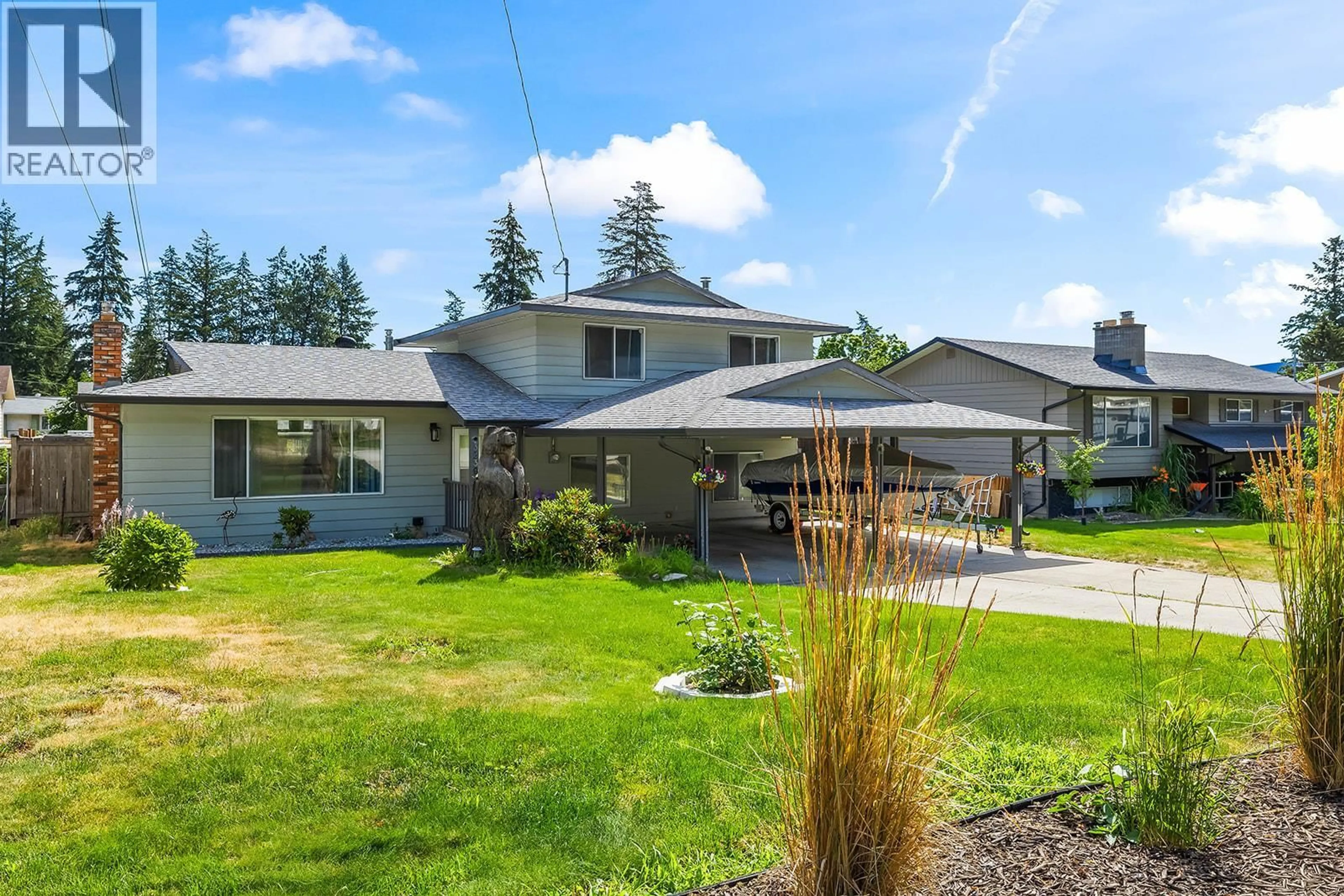 Home with vinyl exterior material, street for 3239 MCIVER ROAD, West Kelowna British Columbia V4T1G1
