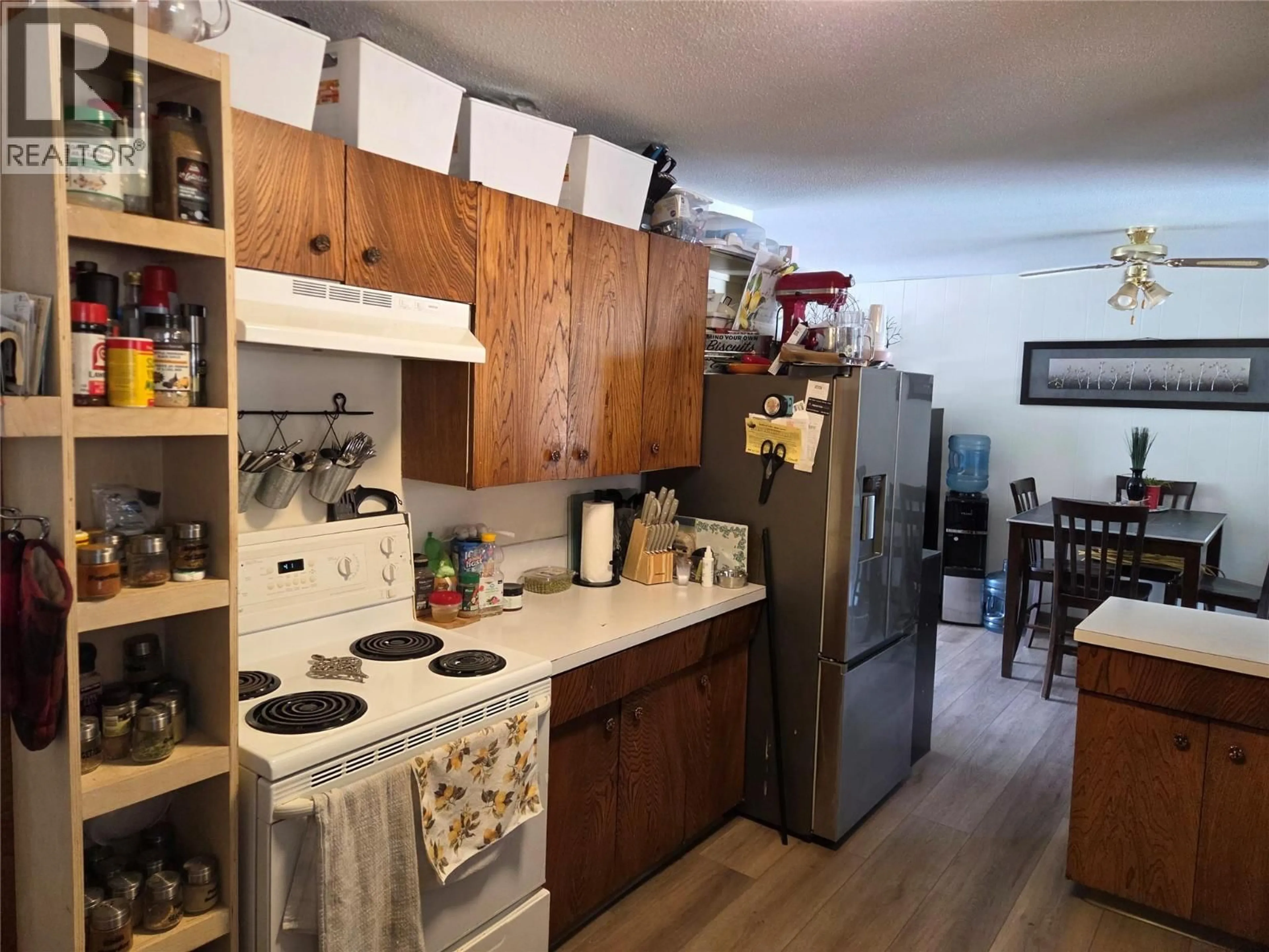 Standard kitchen, wood/laminate floor for 637 EASTSIDE ROAD, Okanagan Falls British Columbia V0H1R5