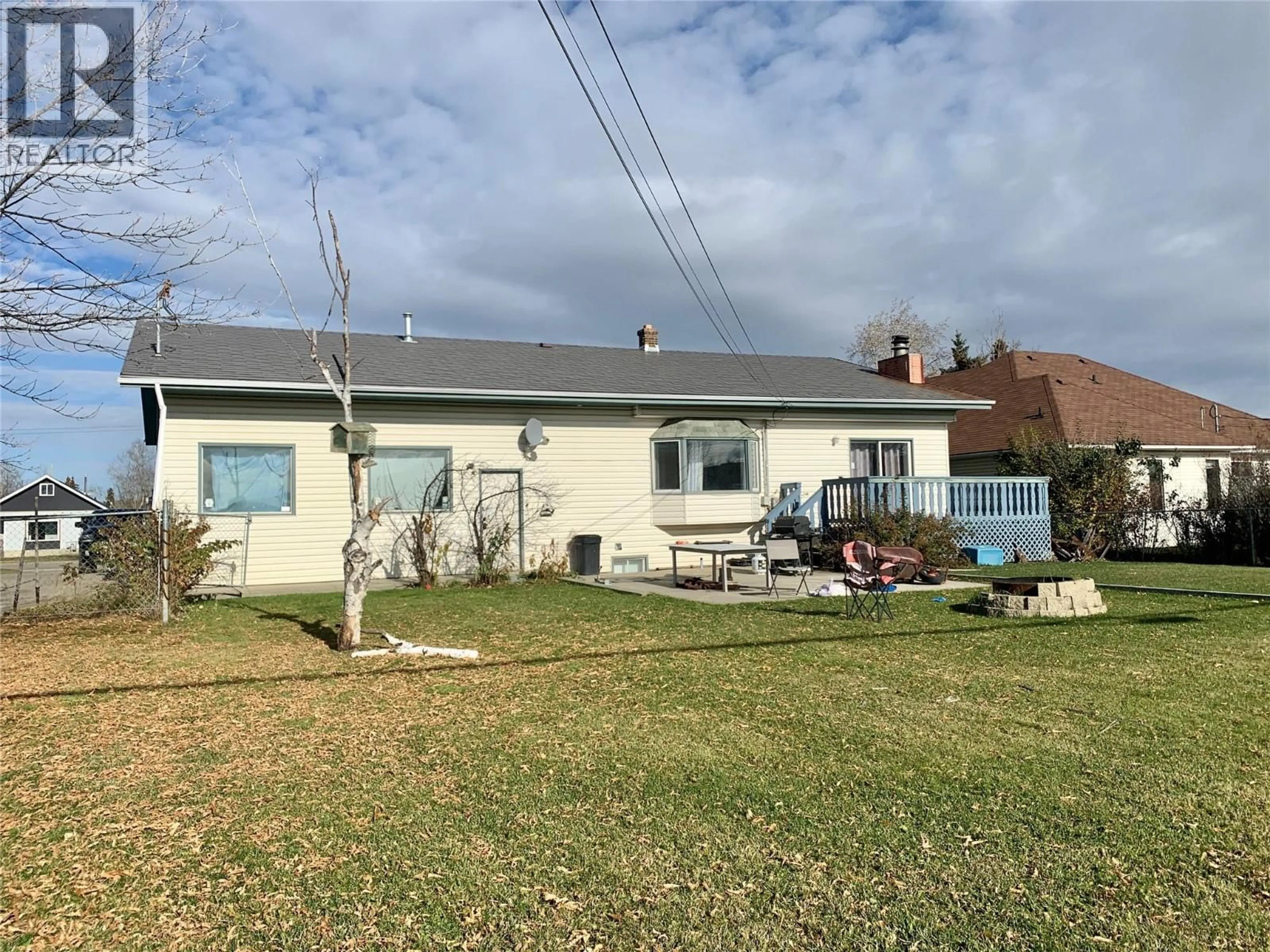 A pic from outside/outdoor area/front of a property/back of a property/a pic from drone, unknown for 1329 108 AVENUE, Dawson Creek British Columbia V1G4J2
