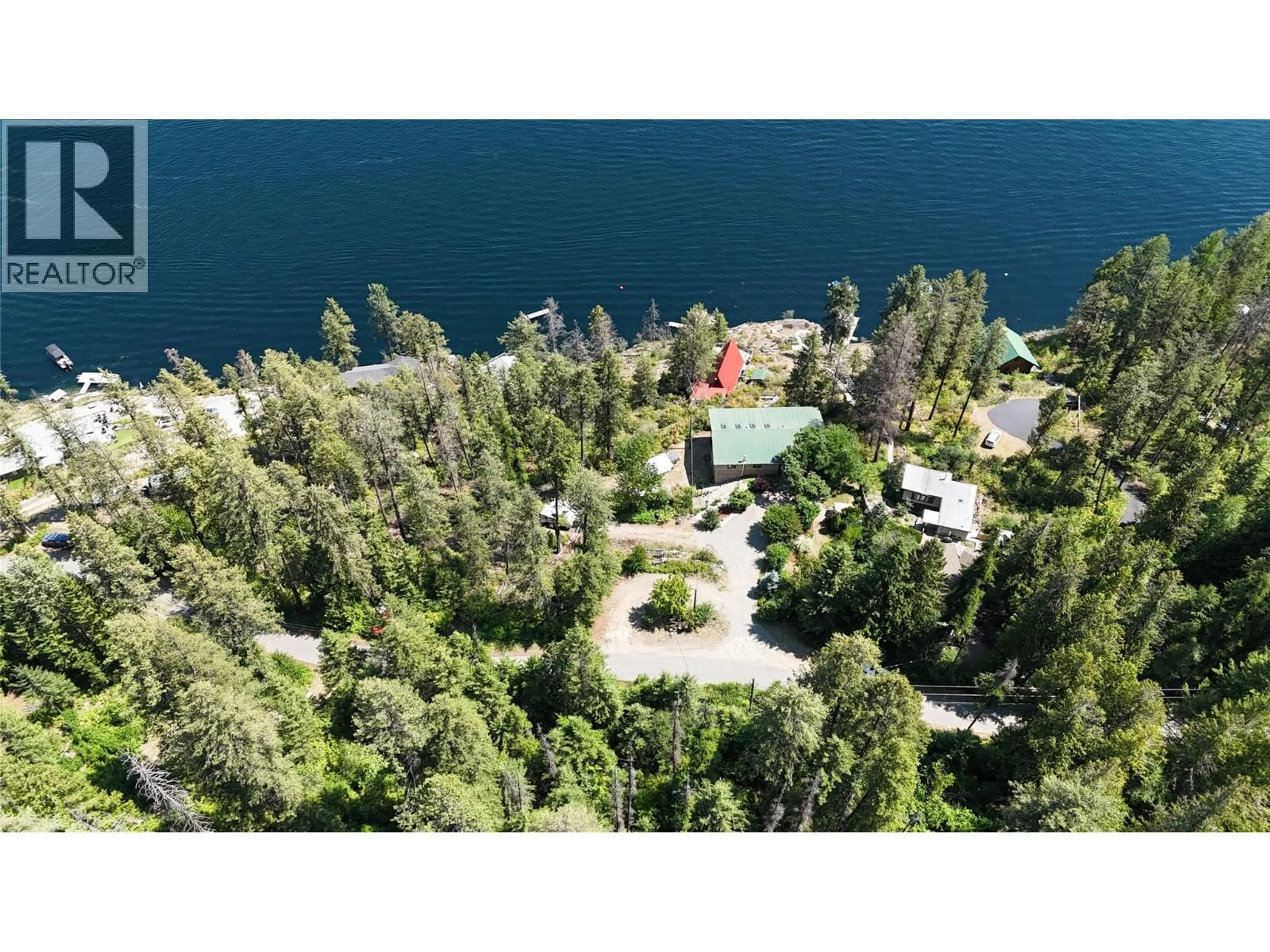 A pic from outside/outdoor area/front of a property/back of a property/a pic from drone, water/lake/river/ocean view for 2186 WEST LAKE DRIVE, Christina Lake British Columbia V0H1E2